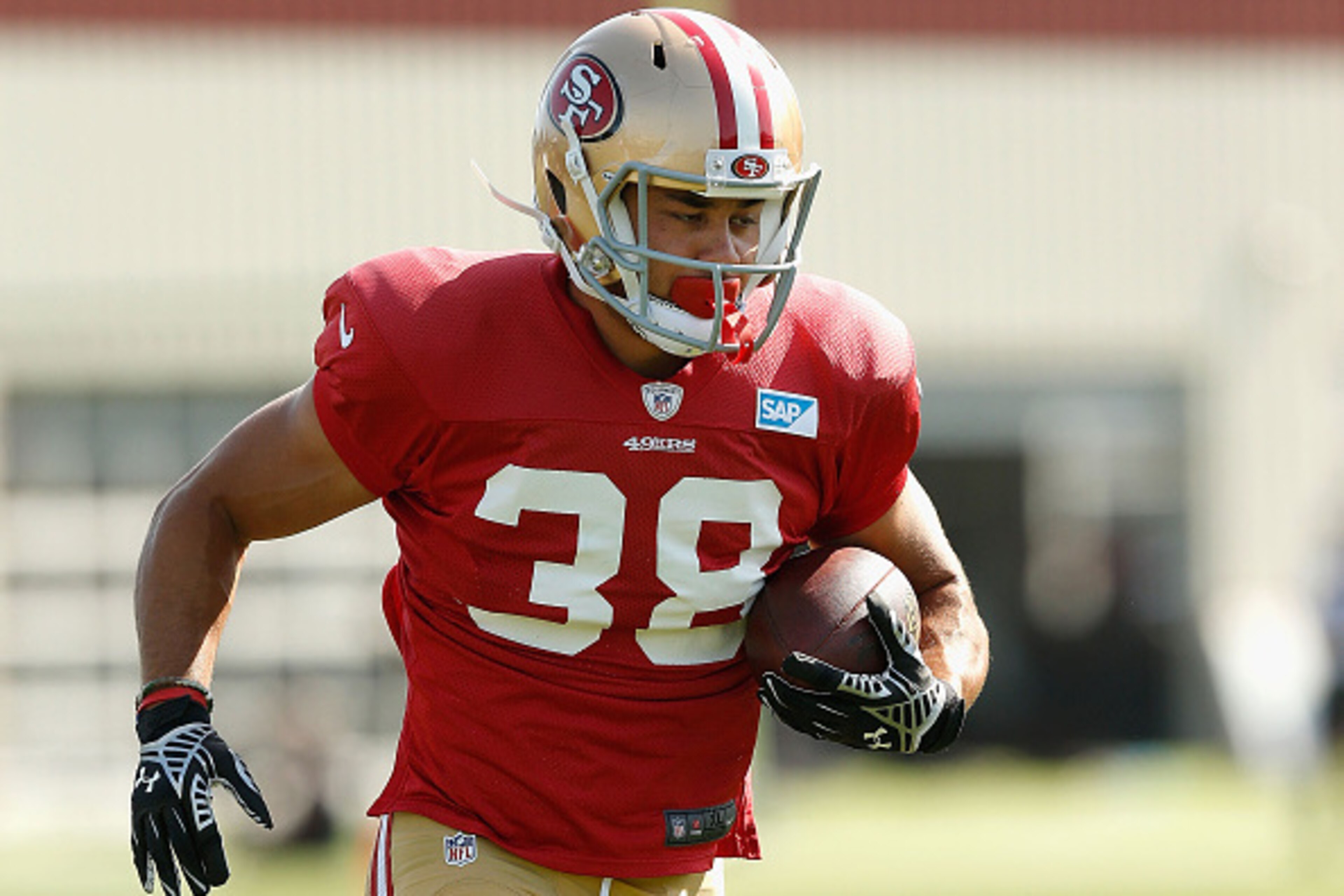 SANTA CLARA, CA - AUGUST 7: Jarryd Hayne #38 of the San Francisco 49ers runs drills during a practice session at Levi's Stadium on August 7, 2015 in Santa Clara, California. Hayne formerly played professional rugby league in Australia for the Parramatta E