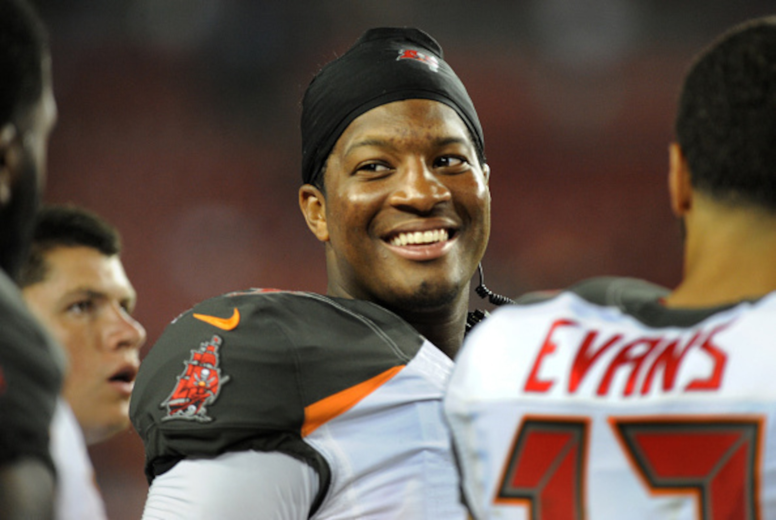 TAMPA, FL - AUGUST 24: Quarterback Jameis Winston #3 of the Tampa Bay Buccaneers talks with teammates on the sideline against the Cincinnati Bengals at Raymond James Stadium in preseason action on August 24, 2015 in Tampa, Florida. (Photo by Cliff McBride TAMPA, FL - AUGUST 24: Quarterback Jameis Winston #3 of the Tampa Bay Buccaneers talks with teammates on the sideline against the Cincinnati Bengals at Raymond James Stadium in preseason action on August 24, 2015 in Tampa, Florida. (Photo by Cliff McBride