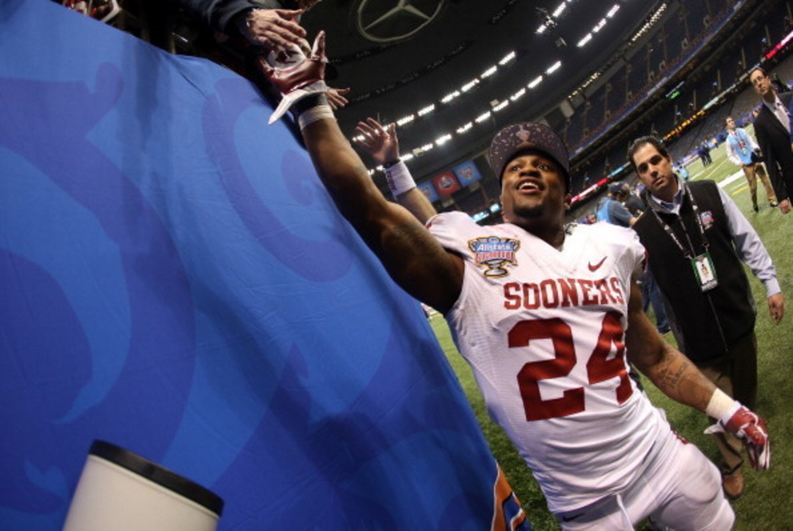 NEW ORLEANS, LA - JANUARY 02: Brennan Clay #24 of the Oklahoma Sooners celebrates on the field after defeating the Alabama Crimson Tide 45-31 during the Allstate Sugar Bowl at the Mercedes-Benz Superdome on January 2, 2014 in New Orleans, Louisiana. (Pho NEW ORLEANS, LA - JANUARY 02: Brennan Clay #24 of the Oklahoma Sooners celebrates on the field after defeating the Alabama Crimson Tide 45-31 during the Allstate Sugar Bowl at the Mercedes-Benz Superdome on January 2, 2014 in New Orleans, Louisiana. (Pho