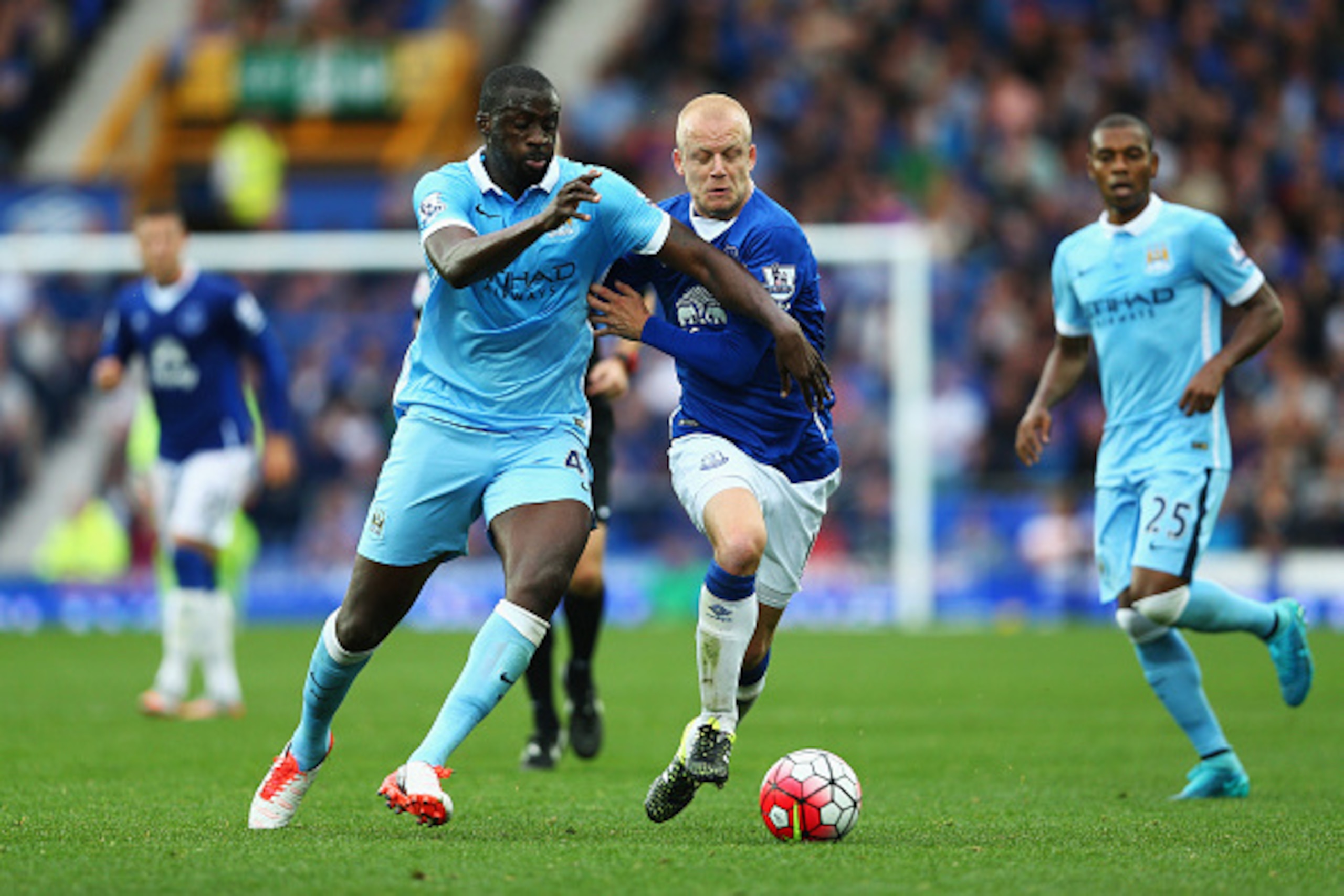 LIVERPOOL, ENGLAND - AUGUST 23: Yaya Toure of Manchester City is challenged by Steven Naismith of Everton during the Barclays Premier League match between Everton and Manchester City at Goodison Park on August 23, 2015 in Liverpool, England. (Photo by C LIVERPOOL, ENGLAND - AUGUST 23: Yaya Toure of Manchester City is challenged by Steven Naismith of Everton during the Barclays Premier League match between Everton and Manchester City at Goodison Park on August 23, 2015 in Liverpool, England. (Photo by C