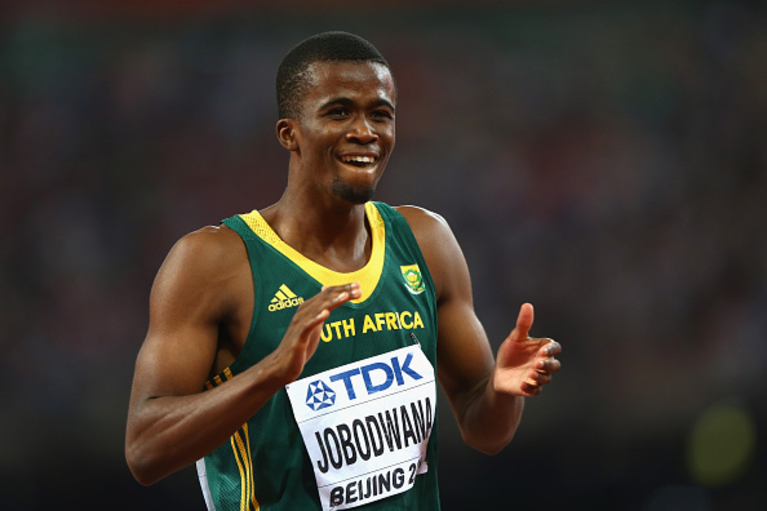 BEIJING, CHINA - AUGUST 27:  Anaso Jobodwana of South Africa celebrates after crossing the finish line to win bronze in the Men's 200 metres final during day six of the 15th IAAF World Athletics Championships Beijing 2015 at Beijing National Stadium on Au