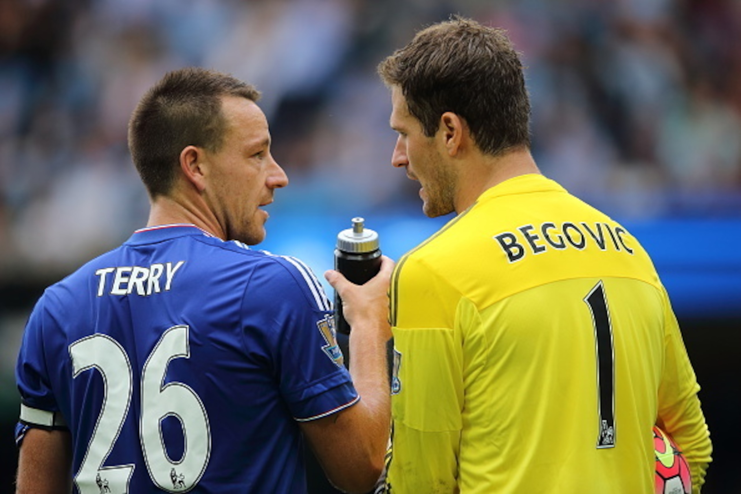 MANCHESTER, ENGLAND - AUGUST 16:  John Terry of Chelsea chats to Asmir Bergovic of Chelsea during the Barclays Premier League match between Manchester City and Chelsea at the Etihad Stadium on August 16, 2015 in Manchester, England.  (Photo by Matthew Ash