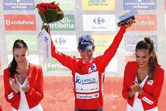 Orica GreenEdge Colombian cyclist Esteban Chaves Rubio celebrates on the podium after winning the second stage of the 2015 Vuelta Espana cycling tour, a 158.7km stage between Alhaurin de la Torre and Caminito del Rey.  AFP PHOTO/JOSE JORDAN        (Photo 