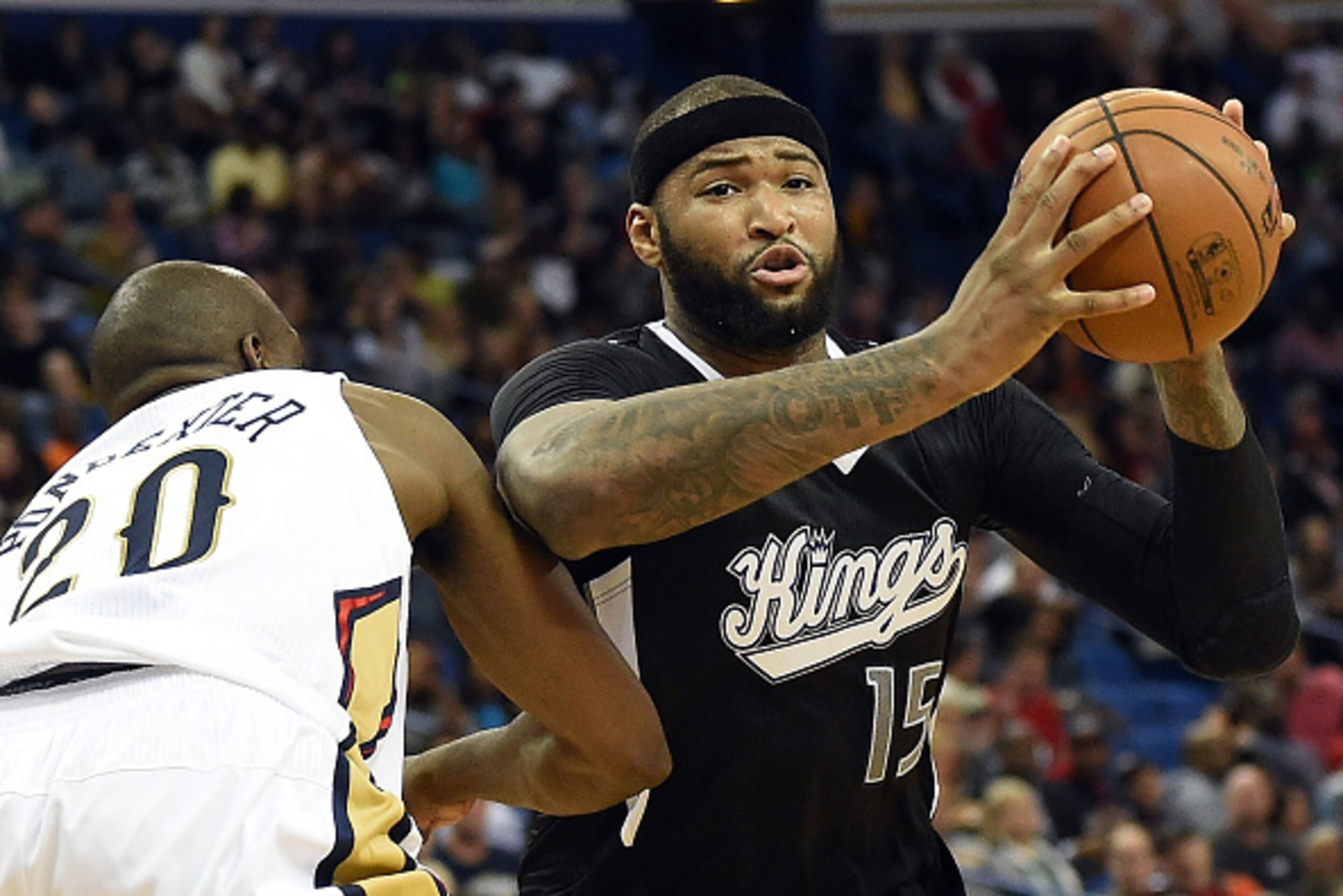 NEW ORLEANS, LA - MARCH 27: DeMarcus Cousins #15 of the Sacramento Kings works against Quincy Pondexter #20 of the New Orleans Pelicans during a game at the Smoothie King Center on March 27, 2015 in New Orleans, Louisiana. NOTE TO USER: User expressly a NEW ORLEANS, LA - MARCH 27: DeMarcus Cousins #15 of the Sacramento Kings works against Quincy Pondexter #20 of the New Orleans Pelicans during a game at the Smoothie King Center on March 27, 2015 in New Orleans, Louisiana. NOTE TO USER: User expressly a