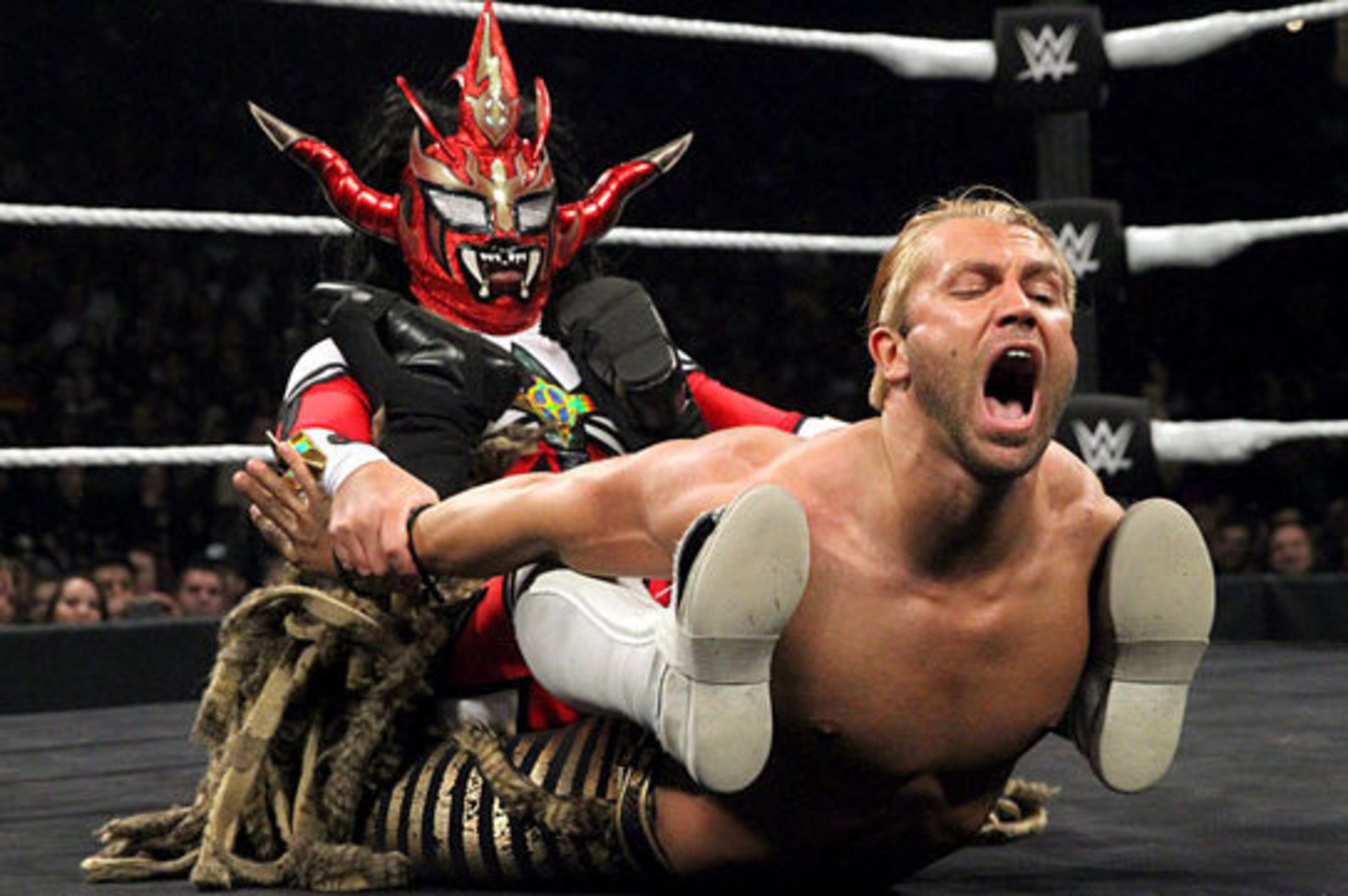 Jushin Liger puts the hurt on Tyler Breeze.