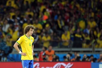 BELO HORIZONTE, BRAZIL - JULY 08: David Luiz of Brazil looks dejected during the 2014 FIFA World Cup Brazil Semi Final match between Brazil and Germany at Estadio Mineirao on July 08, 2014 in Belo Horizonte, Brazil.  (Photo by Chris Brunskill Ltd/Getty Im