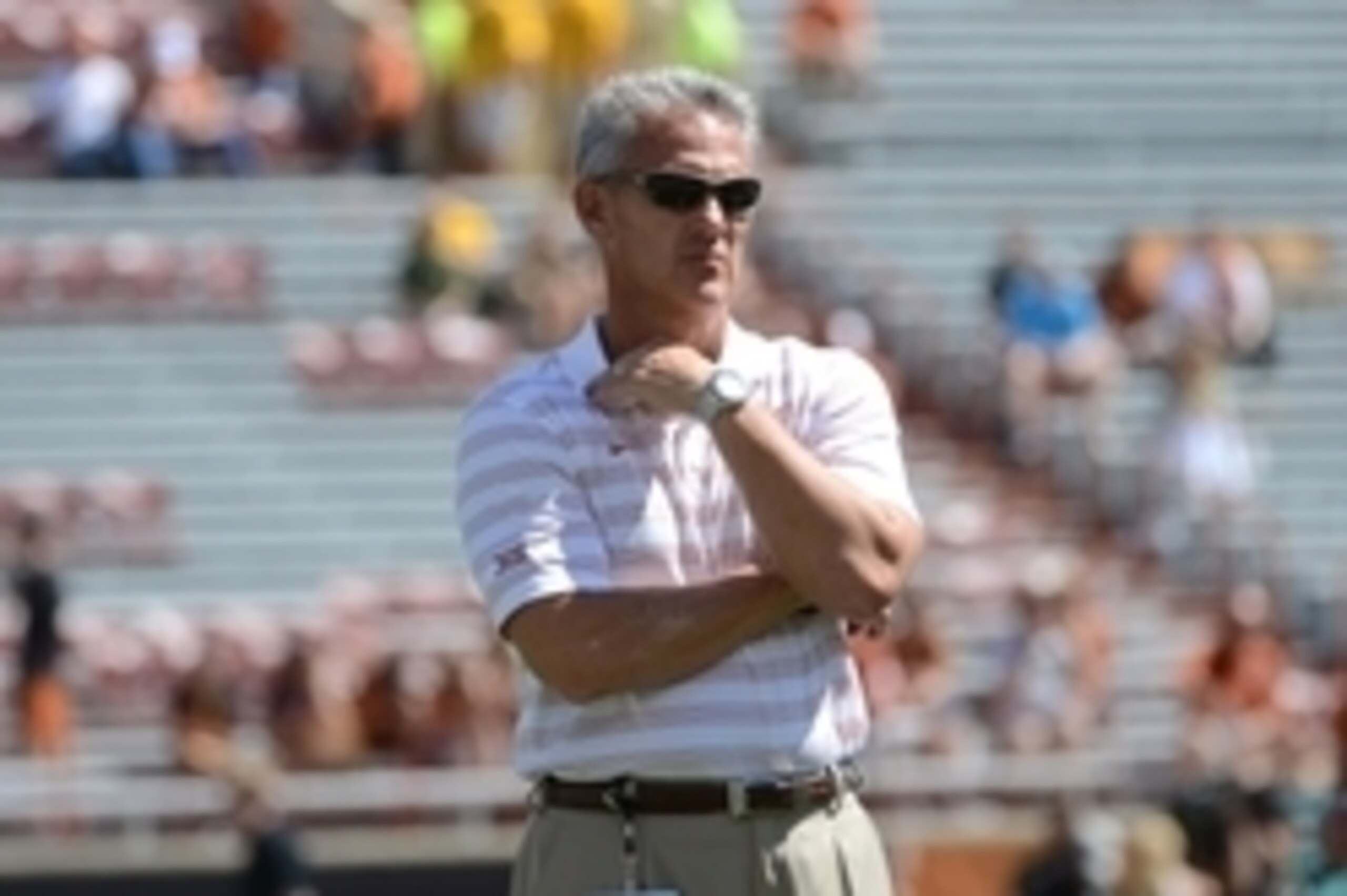 Oct 4, 2014; Austin, TX, USA; Texas Longhorns assistant head coach for offense/quarterbacks Shawn Watson against the Baylor Bears prior to kick off at Darrell K Royal-Texas Memorial Stadium. Mandatory Credit: Brendan Maloney-USA TODAY Sports