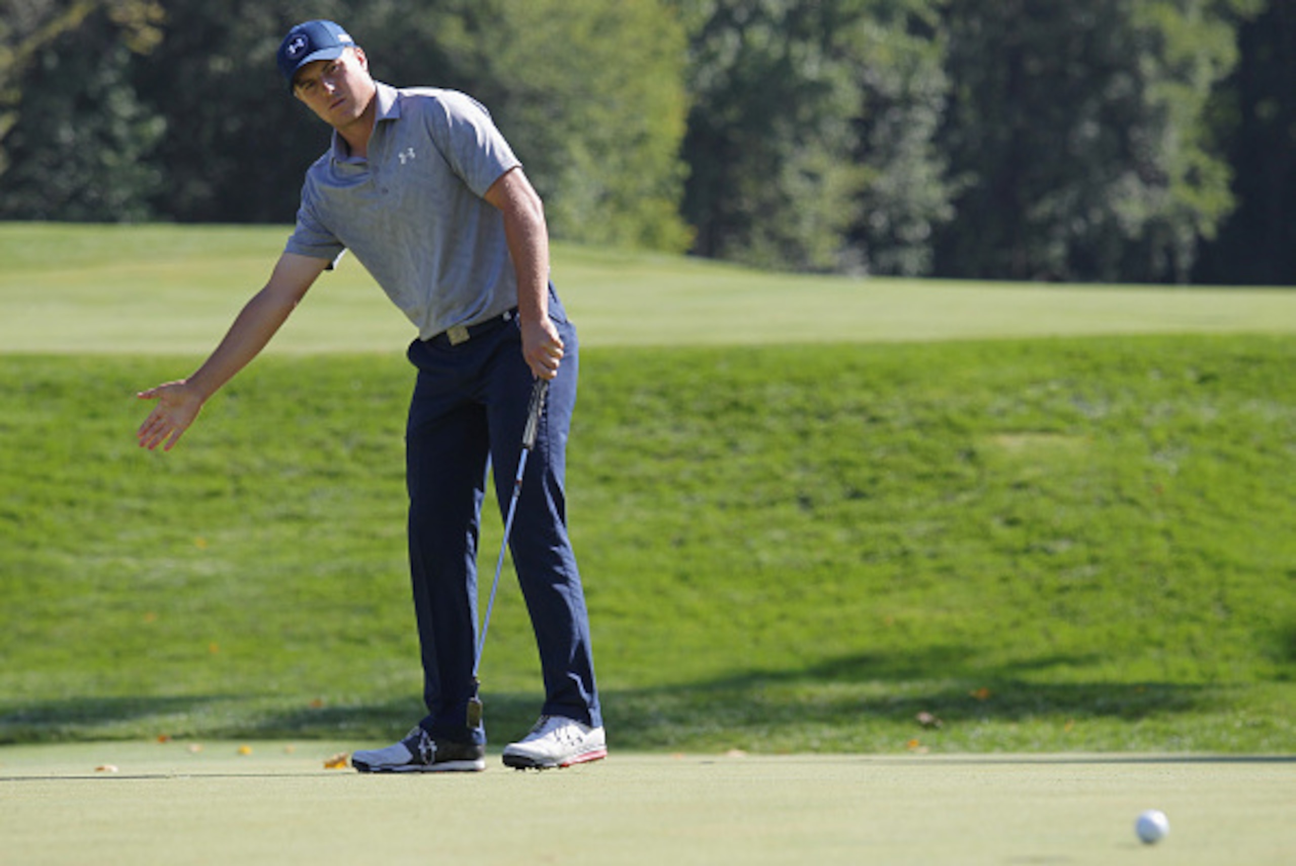 EDISON, NJ - AUGUST 27:  Jordan Spieth of the United States reacts to a missed birdie putt on the 15th hole during the first round of The Barclays at Plainfield Country Club on August 27, 2015 in Edison, New Jersey.  (Photo by Hunter Martin/Getty Images)