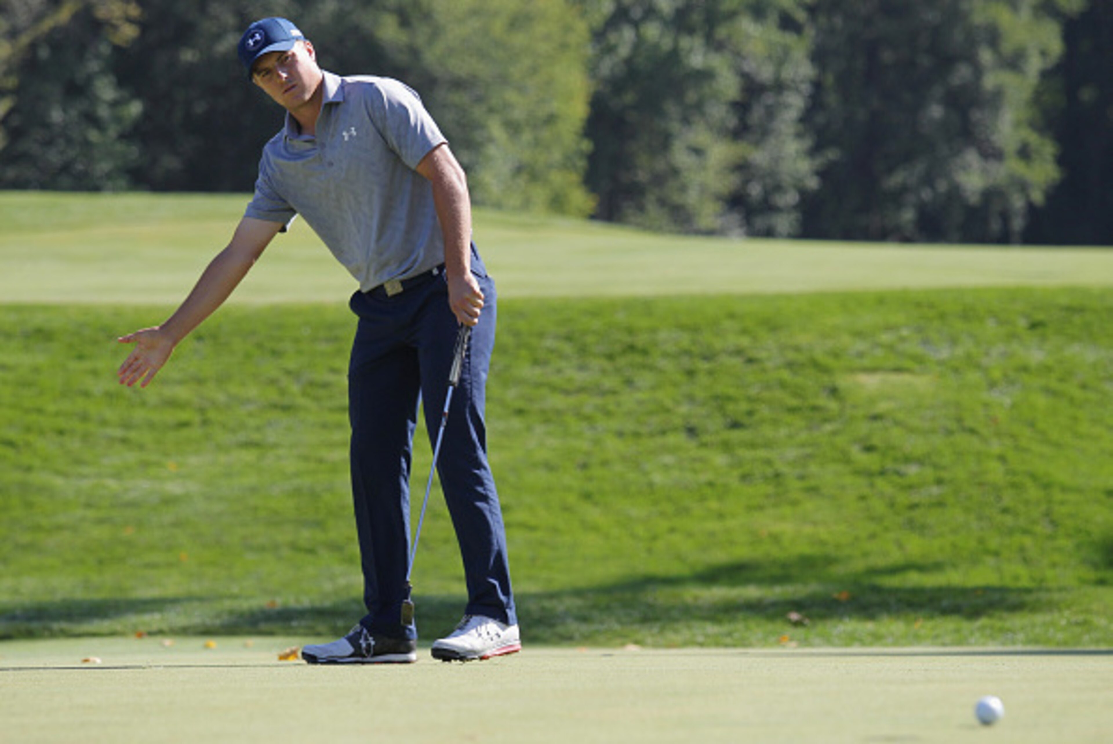 EDISON, NJ - AUGUST 27:  Jordan Spieth of the United States reacts to a missed birdie putt on the 15th hole during the first round of The Barclays at Plainfield Country Club on August 27, 2015 in Edison, New Jersey.  (Photo by Hunter Martin/Getty Images)