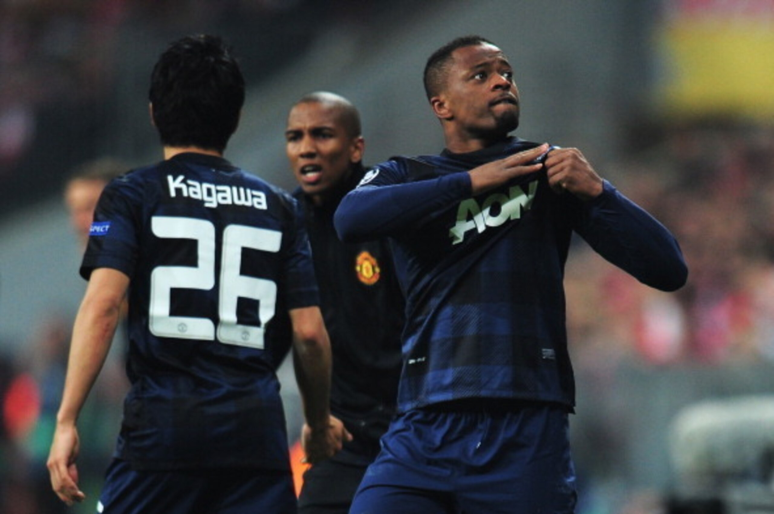 MUNICH, GERMANY - APRIL 09: Patrice Evra of Manchester United celebrates his goal during the UEFA Champions League Quarter Final second leg match between FC Bayern Muenchen and Manchester United at Allianz Arena on April 9, 2014 in Munich, Germany. (Pho MUNICH, GERMANY - APRIL 09: Patrice Evra of Manchester United celebrates his goal during the UEFA Champions League Quarter Final second leg match between FC Bayern Muenchen and Manchester United at Allianz Arena on April 9, 2014 in Munich, Germany. (Pho