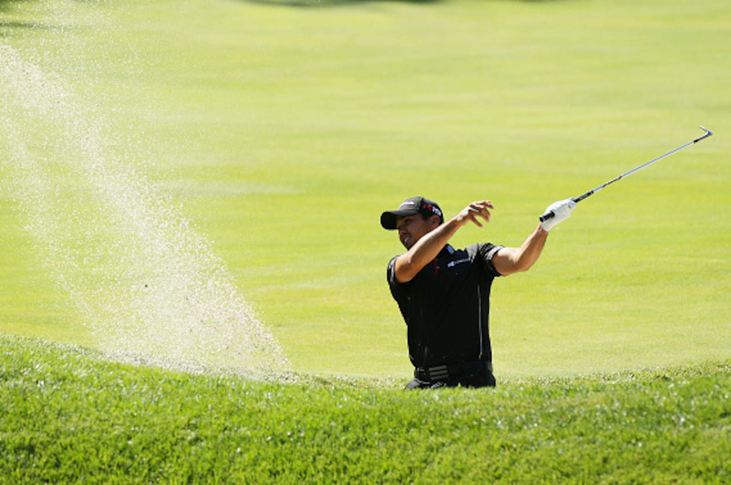 EDISON, NJ - AUGUST 27:  Jason Day of Australia plays a bunker shot during the first round of The Barclays at Plainfield Country Club on August 27, 2015 in Edison, New Jersey.  (Photo by Hunter Martin/Getty Images)