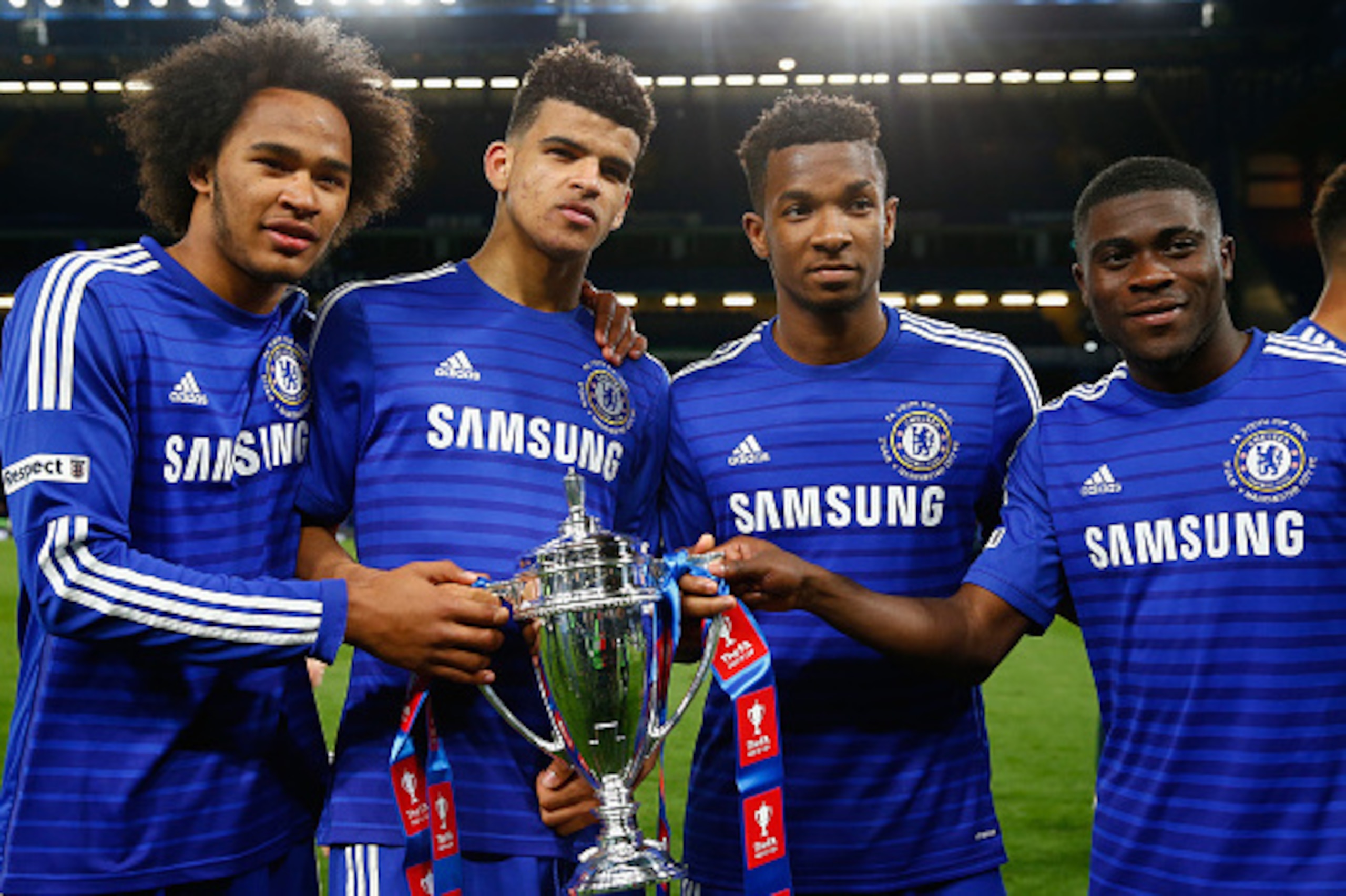 LONDON, ENGLAND - APRIL 27:  (L-R) Isaiah Brown, Dominic Solanke, Kasey Palmer and Jeremie Boga of Chelsea with the winners trophy during the FA Youth Cup Final second leg match between Chelsea and Manchester City at Stamford Bridge on April 27, 2015 in L