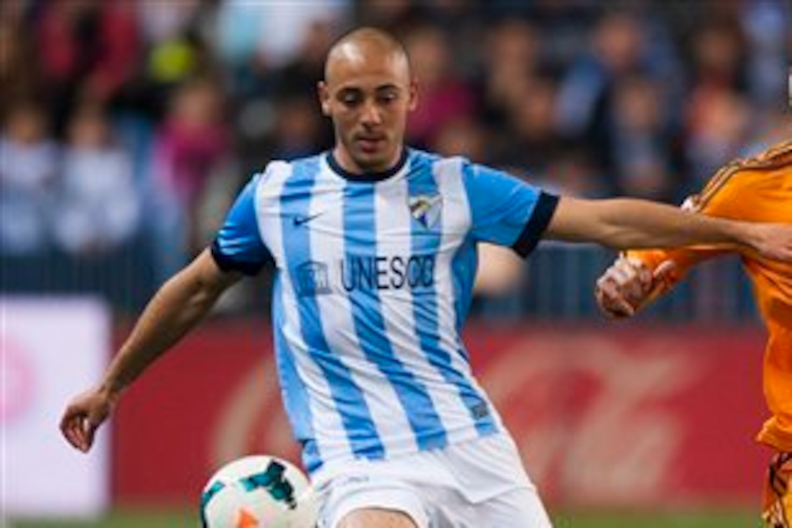 Malaga can profit if Nordin Amrabat can get at Sergi Roberto.