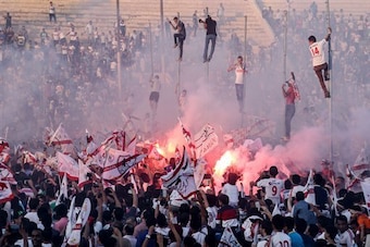 I went to an arson-fueled riot and a soccer game briefly broke out!