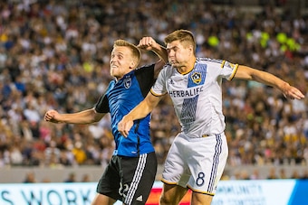 CARSON, CA - JULY 17: Tommy Thompson #22 of San Jose Earthquakes elbows Steven Gerrard #8 of Los Angeles Galaxy during Los Angeles Galaxy's MLS match against San Jose Earthquakes at the StubHub Center on July 17, 2015 in Carson, California.  The LA Galaxy
