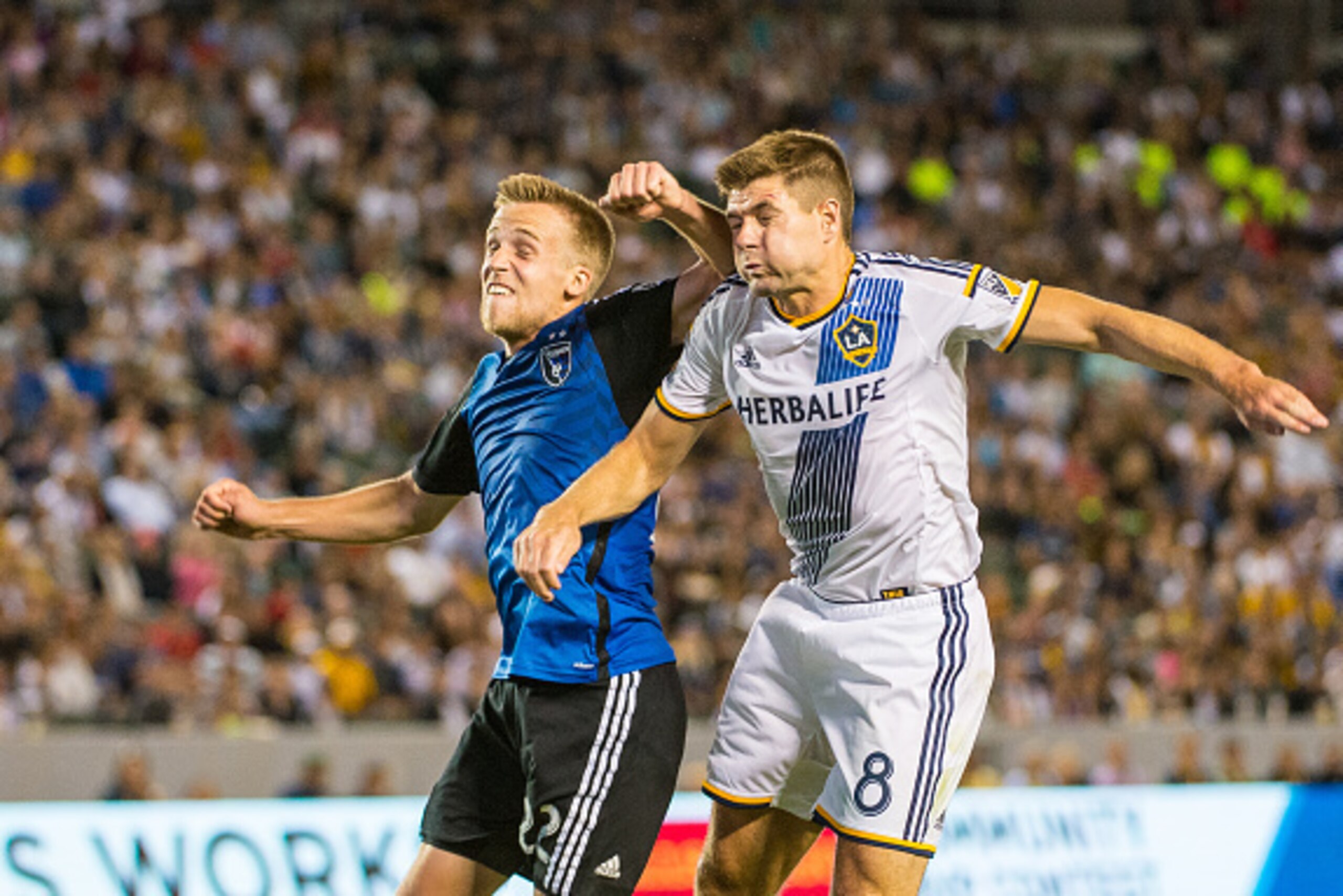 CARSON, CA - JULY 17: Tommy Thompson #22 of San Jose Earthquakes elbows Steven Gerrard #8 of Los Angeles Galaxy during Los Angeles Galaxy's MLS match against San Jose Earthquakes at the StubHub Center on July 17, 2015 in Carson, California.  The LA Galaxy