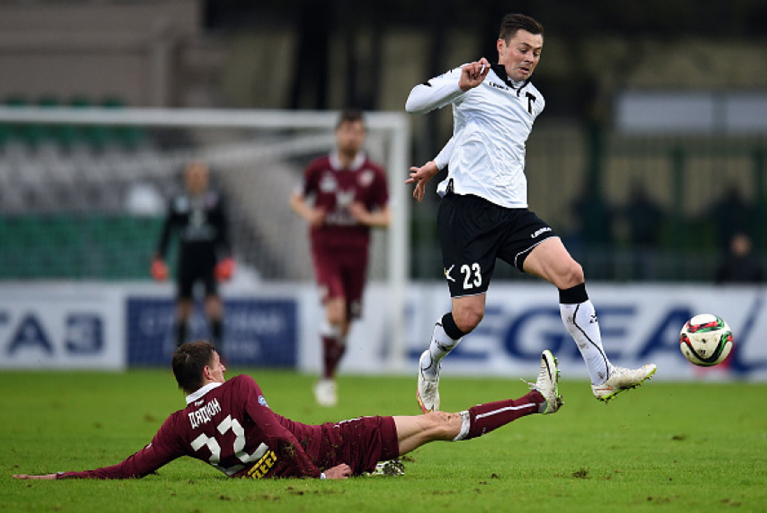 MOSCOW, RUSSIA - MAY 03: Diniyar Bilyaletdinov (R) of FC Torpedo Moscow is challenged by Vladimir Dyadyun of FC Rubin Kazan during the Russian Premier League match between FC Torpedo Moscow and FC Rubin Kazan at the Eduard Streltsov Stadium on May 03, 201