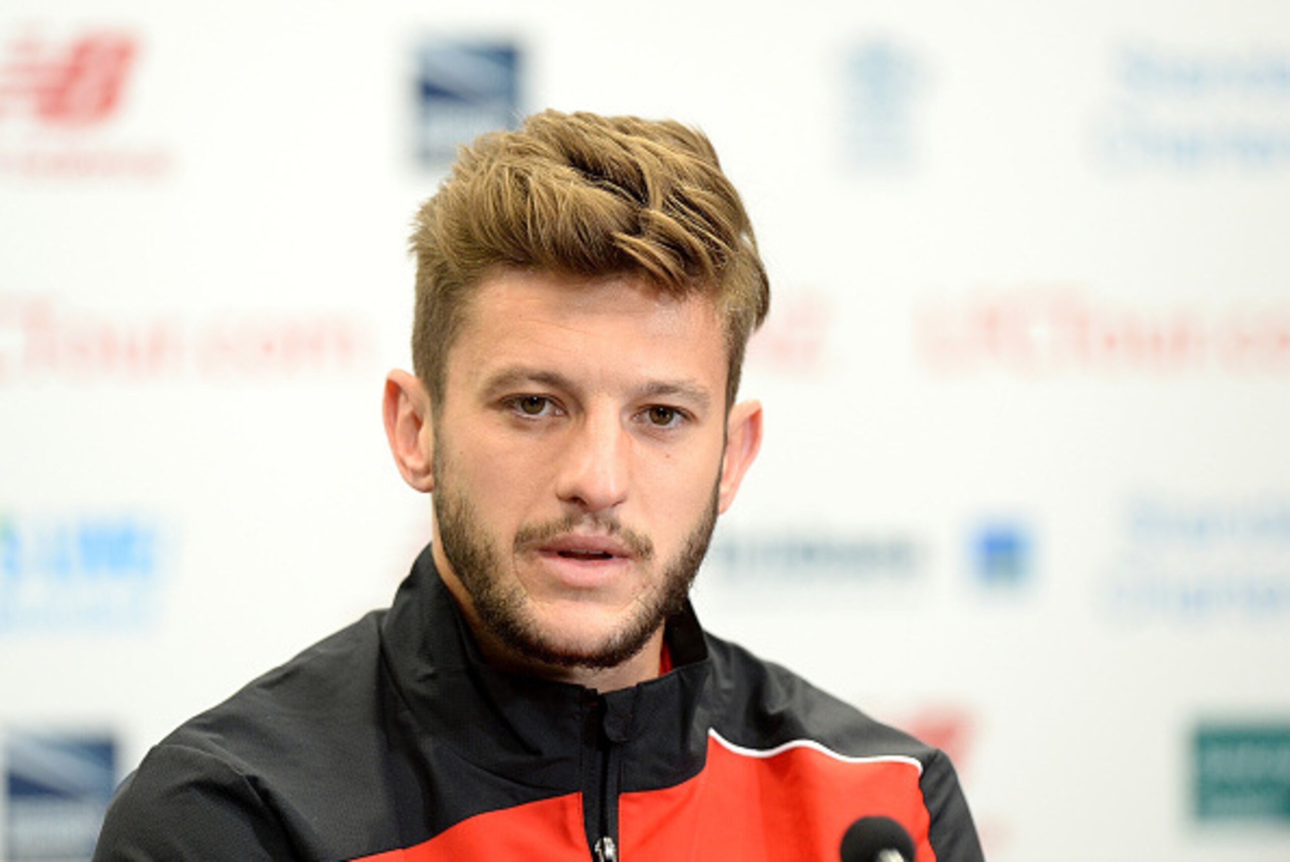 BRISBANE, AUSTRALIA - JULY 16:  Adam Lallana speaks during a Liverpool FC press conference at Suncorp Stadium on July 16, 2015 in Brisbane, Australia.
