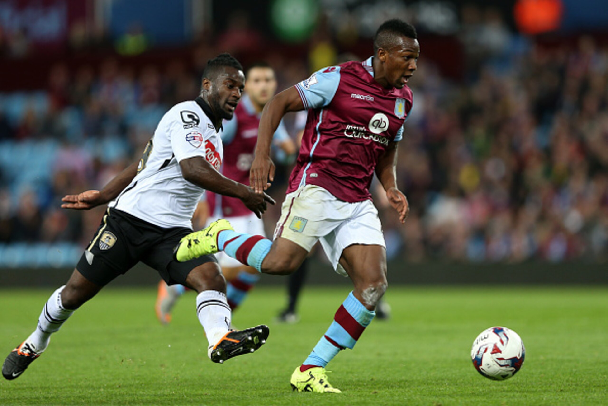 BIRMINGHAM, ENGLAND - AUGUST 25: Adama Traore of Aston Villa is challenged by Stanley Aborah of Notts County during the Capital One Cup second round match between Aston Villa and Notts County at Villa Park on August 25, 2015 in Birmingham, England. (Pho BIRMINGHAM, ENGLAND - AUGUST 25: Adama Traore of Aston Villa is challenged by Stanley Aborah of Notts County during the Capital One Cup second round match between Aston Villa and Notts County at Villa Park on August 25, 2015 in Birmingham, England. (Pho