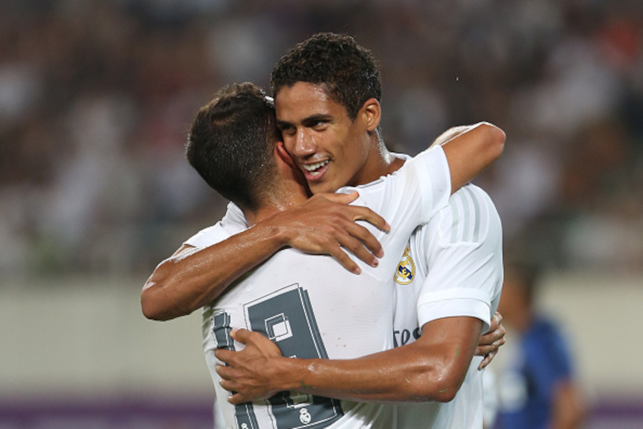 GUANGZHOU, CHINA - JULY 27: Varane of Real Madrid celebrates his goal with his teammate Lucas Vazquez during the match of International Champions Cup match between Real Madrid and FC Internazionale at Tianhe Stadium on July 27, 2015 in Guangzhou, China. (