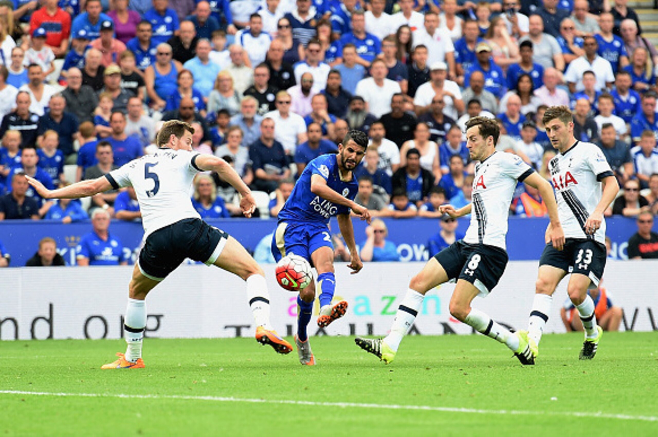 LEICESTER, ENGLAND - AUGUST 22:  Riyad Mahrez of Leicester City scores his team's first goal during the Barclays Premier League match between Leicester City and Tottenham Hotspur at The King Power Stadium on August 22, 2015 in Leicester, England.  (Photo 