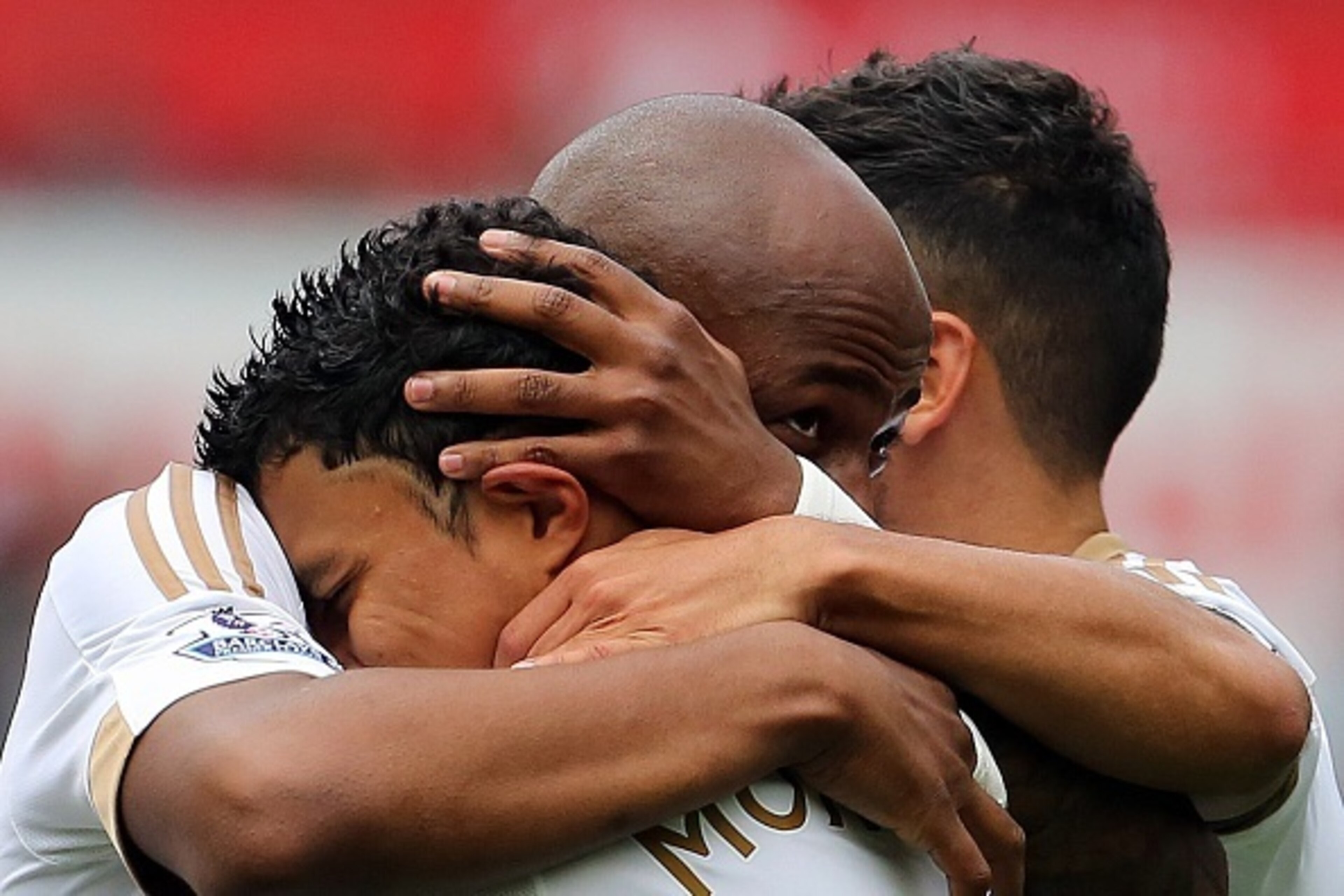 Swansea City's French-born Ghanaian striker Andre Ayew (C) celebrates with Swansea City's Ecuadorian midfielder Jefferson Montero after scoring during the English Premier League football match between Swansea and Newcastle at The Liberty Stadium in Swanse Swansea City's French-born Ghanaian striker Andre Ayew (C) celebrates with Swansea City's Ecuadorian midfielder Jefferson Montero after scoring during the English Premier League football match between Swansea and Newcastle at The Liberty Stadium in Swanse