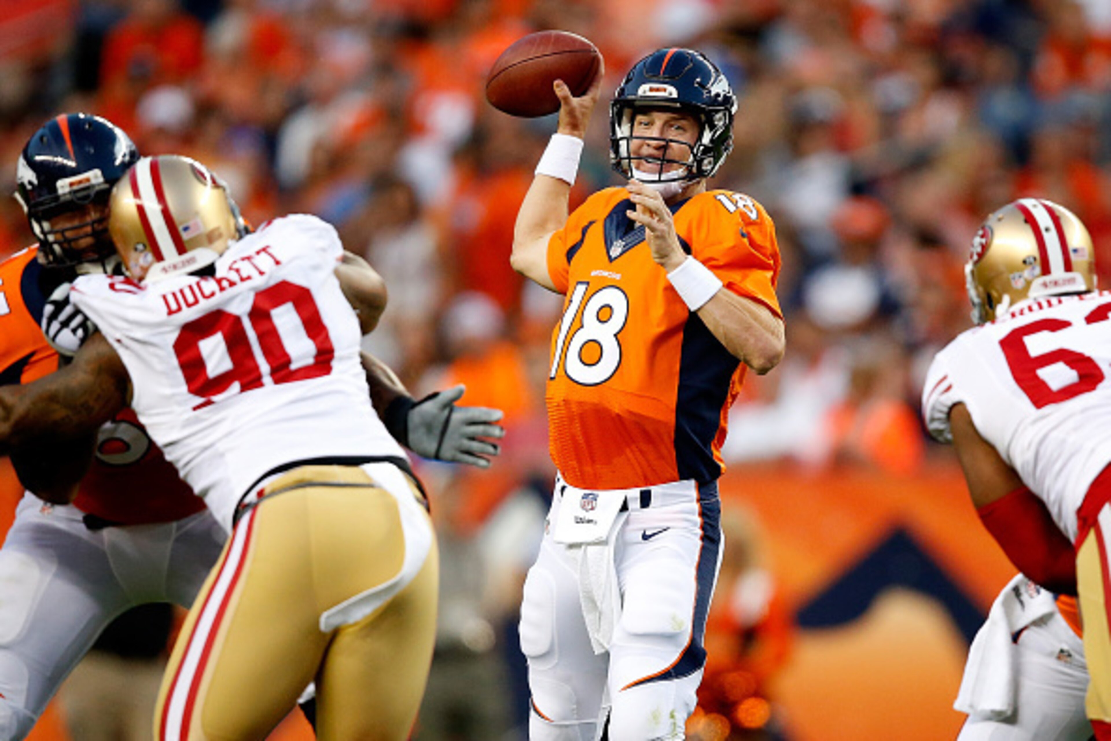 DENVER, CO - AUGUST 29:  Quarterback Peyton Manning #18 of the Denver Broncos delivers a pass against the San Francisco 49ers during preseason action at Sports Authority Field at Mile High on August 29, 2015 in Denver, Colorado.  (Photo by Doug Pensinger/