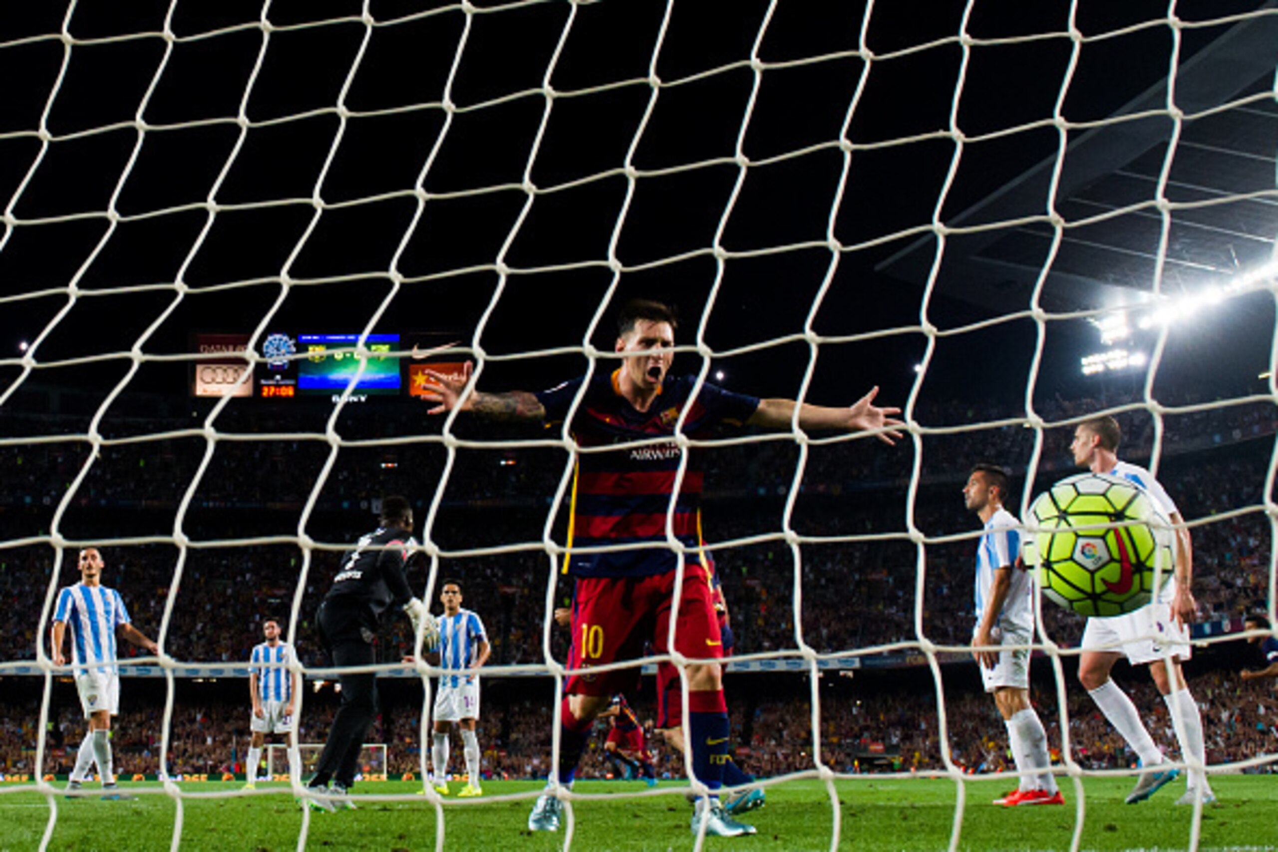 BARCELONA, SPAIN - AUGUST 29:  Lionel Messi of FC Barcelona celebrates after his teammate Thomas Vermaelen scored the opening goal during the La Liga match between FC Barcelona and Malaga CF at Camp Nou on August 29, 2015 in Barcelona, Spain.  (Photo by A