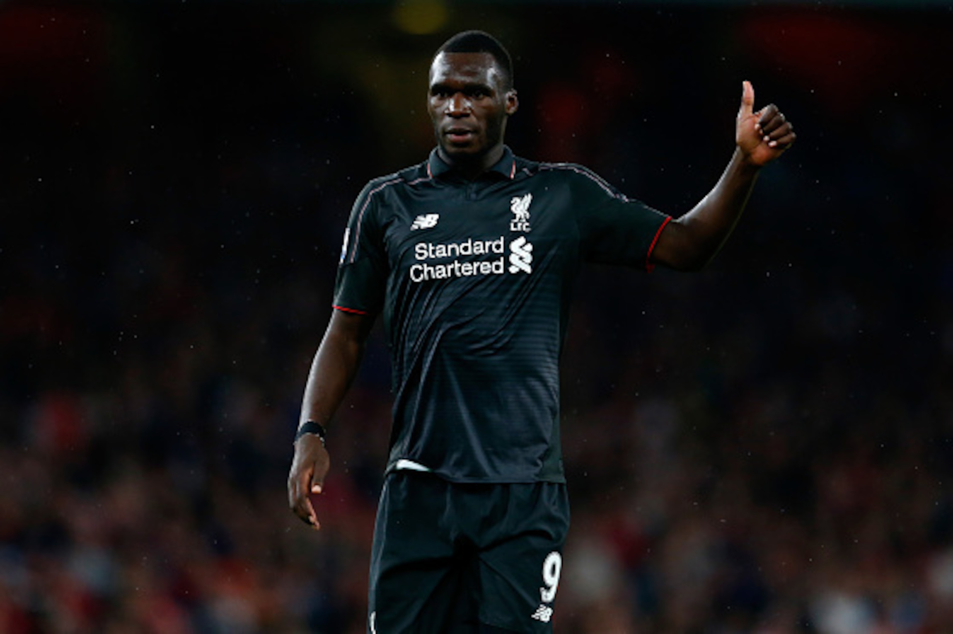 LONDON, ENGLAND - AUGUST 24:  Christian Benteke of Liverpool gives a thumbs up during the Barclays Premier League match between Arsenal and Liverpool at the Emirates Stadium on August 24, 2015 in London, United Kingdom.  (Photo by Julian Finney/Getty Imag