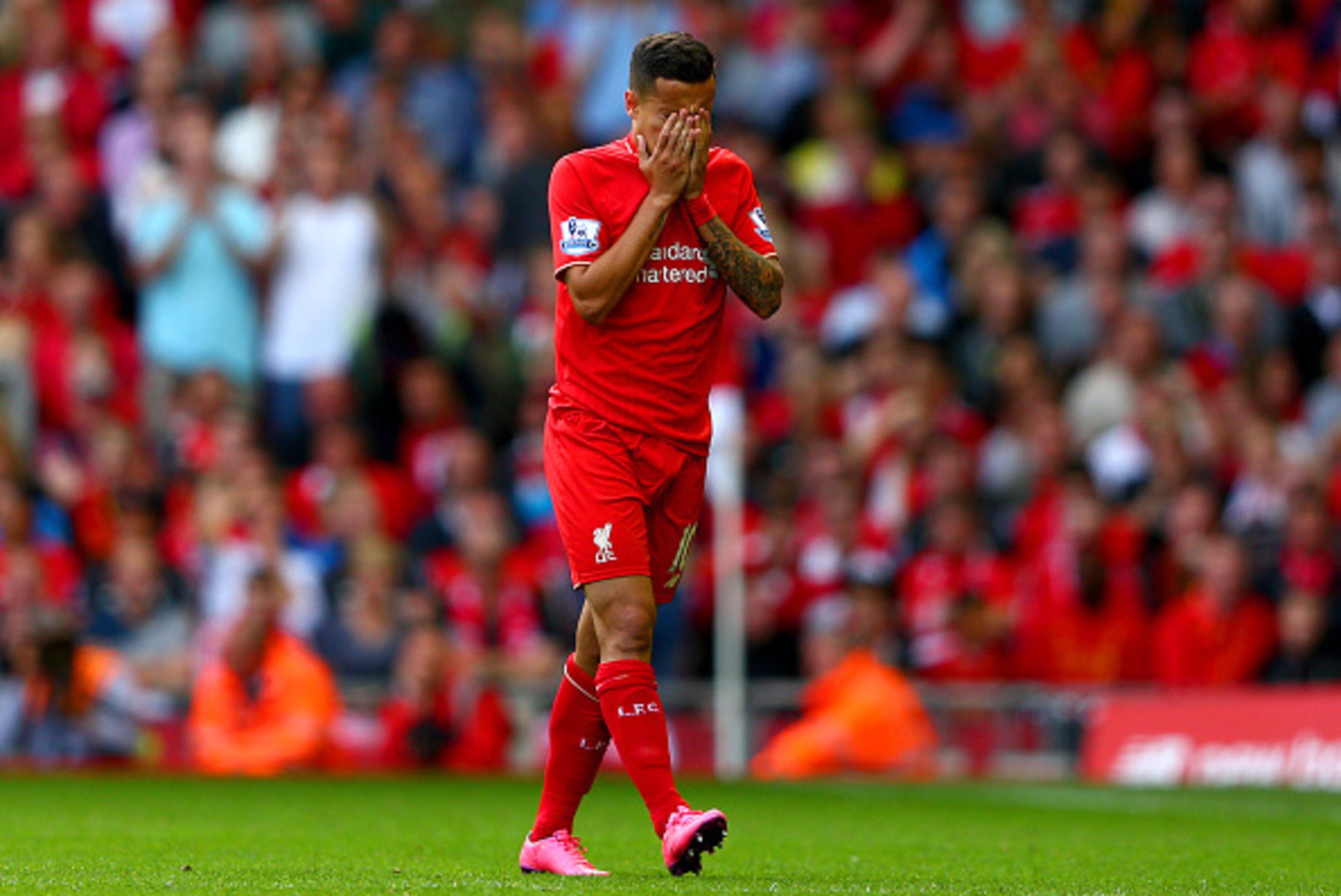LIVERPOOL, ENGLAND - AUGUST 29:  Philippe Coutinho of Liverpool walks off the pitch after receiving a red card during the Barclays Premier League match between Liverpool and West Ham United at Anfield on August 29, 2015 in Liverpool, England.  (Photo by C