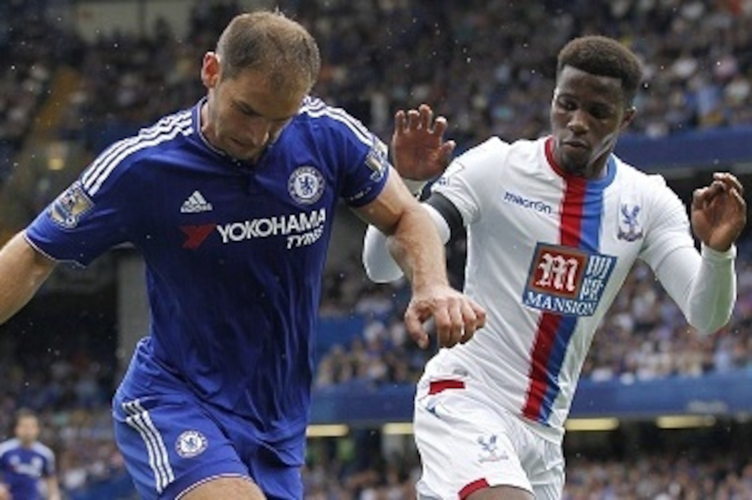 Chelseas Serbian defender Branislav Ivanovic (L) vies for the ball with Crystal Palaces Ivorian-born English striker Wilfried Zaha during the English Premier League football match between Chelsea and Crystal Palace at Stamford Bridge in London on August 2 Chelseas Serbian defender Branislav Ivanovic (L) vies for the ball with Crystal Palaces Ivorian-born English striker Wilfried Zaha during the English Premier League football match between Chelsea and Crystal Palace at Stamford Bridge in London on August 2