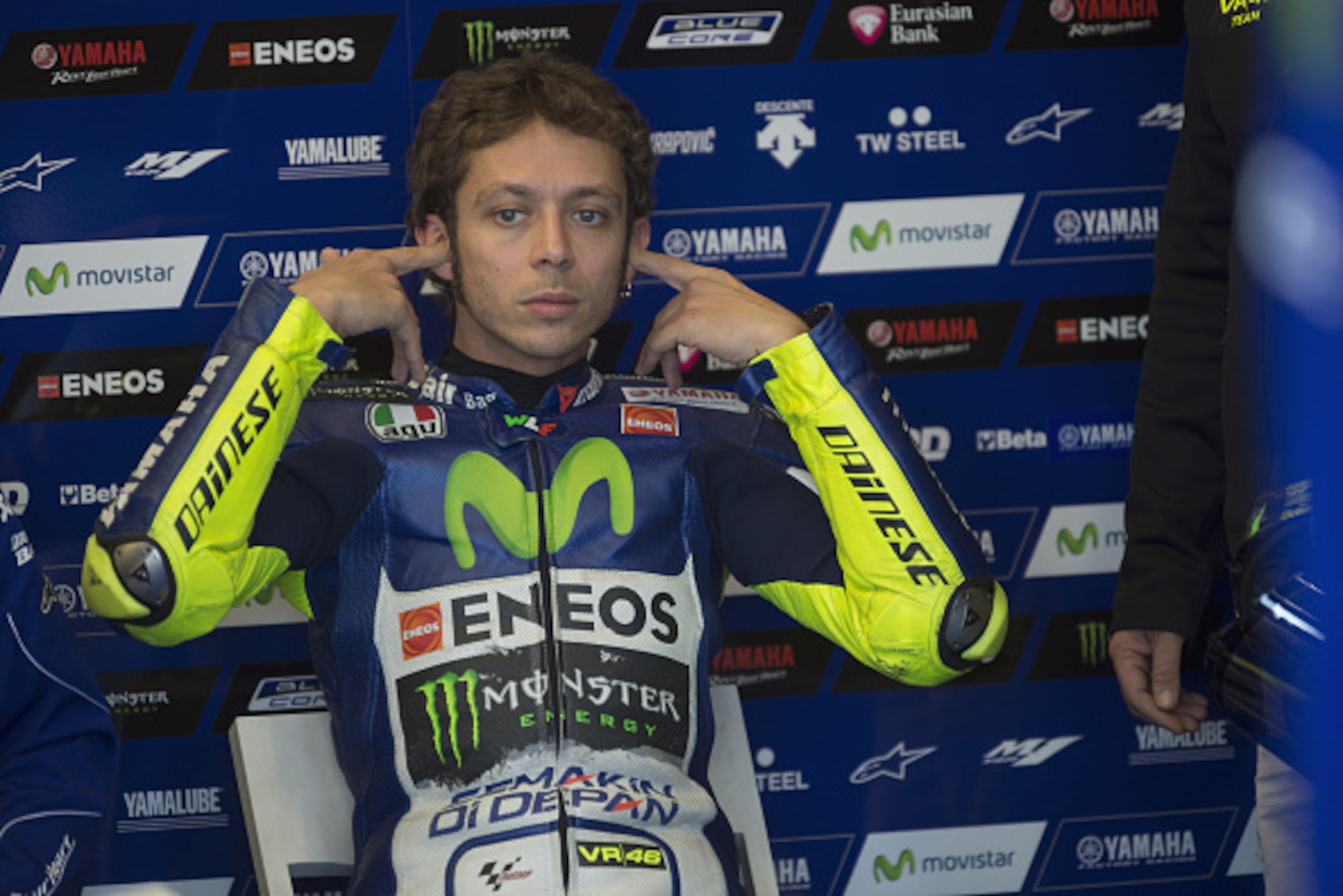 NORTHAMPTON, ENGLAND - AUGUST 28:  Valentino Rossi of Italy and Movistar Yamaha MotoGP prepares to start in box during the MotoGp Of Great Britain - Free Practice at Silverstone Circuit on August 28, 2015 in Northampton, United Kingdom.  (Photo by Mirco L