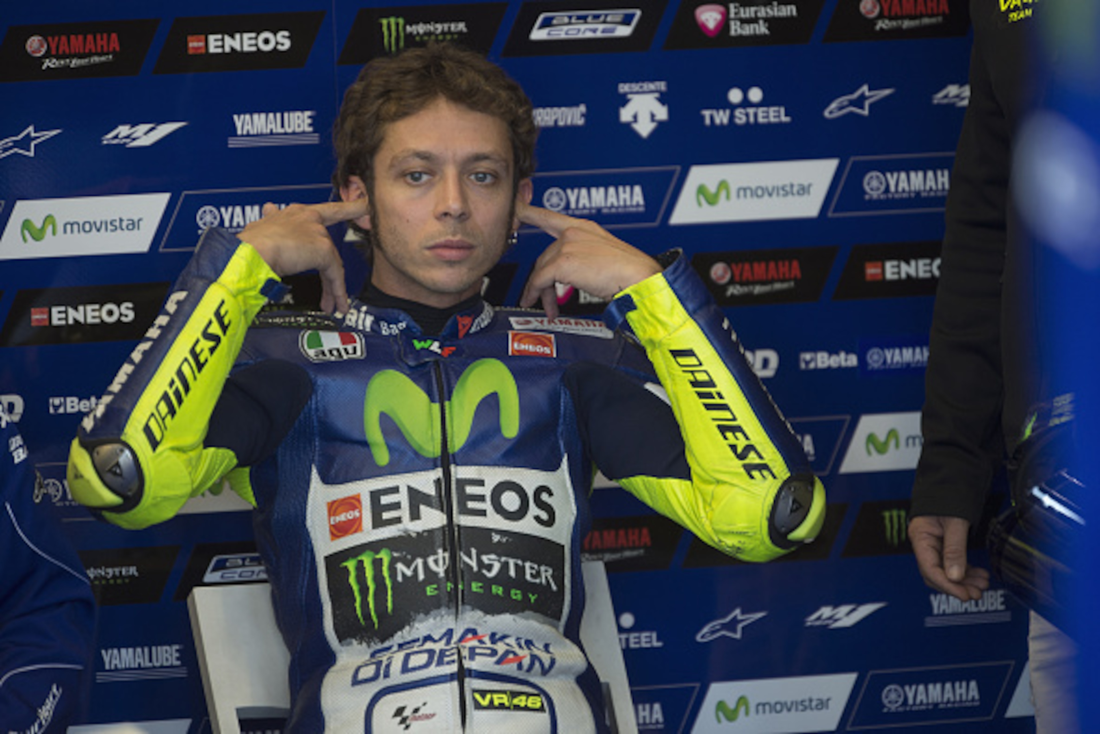 NORTHAMPTON, ENGLAND - AUGUST 28:  Valentino Rossi of Italy and Movistar Yamaha MotoGP prepares to start in box during the MotoGp Of Great Britain - Free Practice at Silverstone Circuit on August 28, 2015 in Northampton, United Kingdom.  (Photo by Mirco L