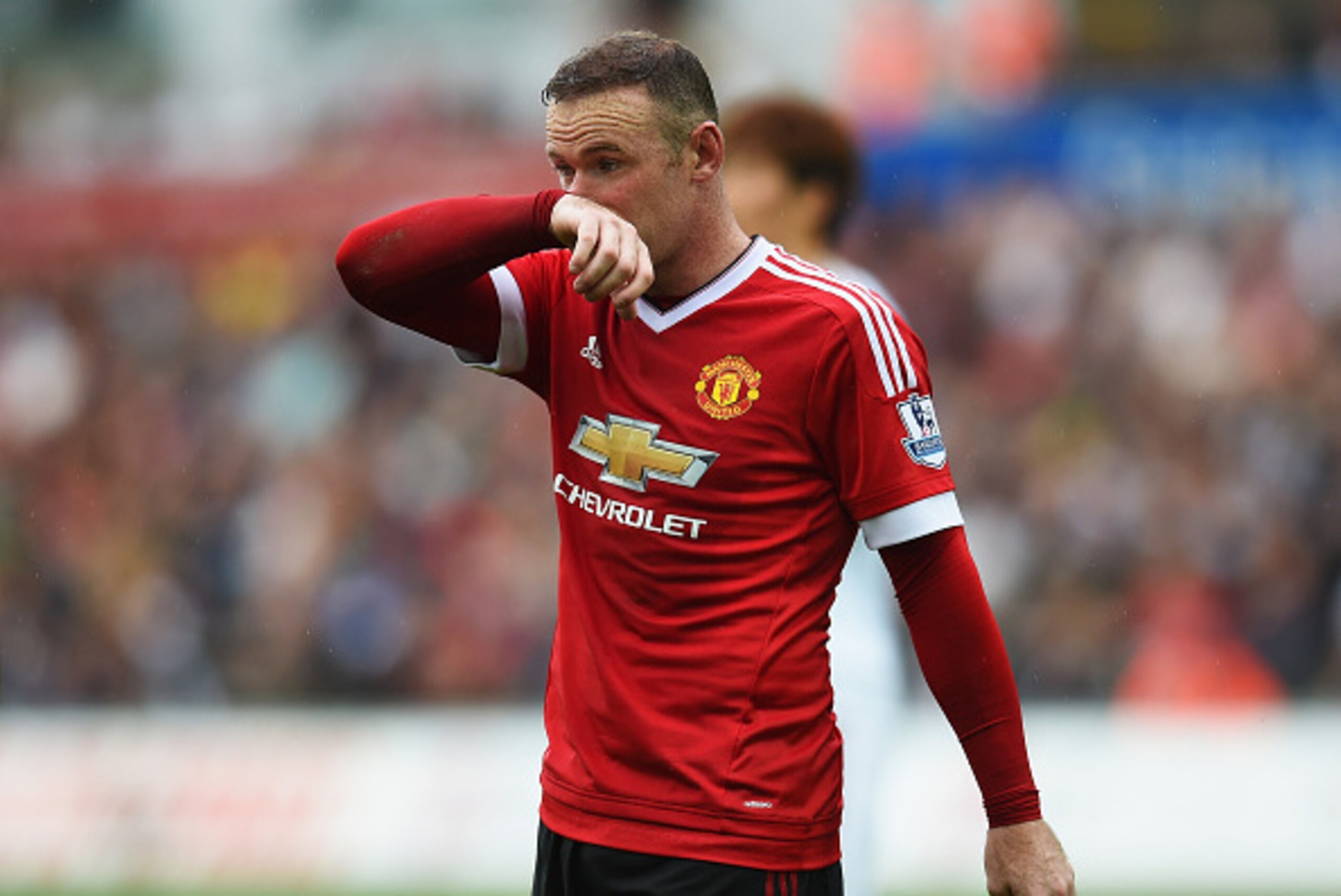 SWANSEA, WALES - AUGUST 30: Wayne Rooney of Manchester United looks dejected during the Barclays Premier League match between Swansea City and Manchester United at Liberty Stadium on August 30, 2015 in Swansea, Wales.  (Photo by Michael Regan/Getty Images
