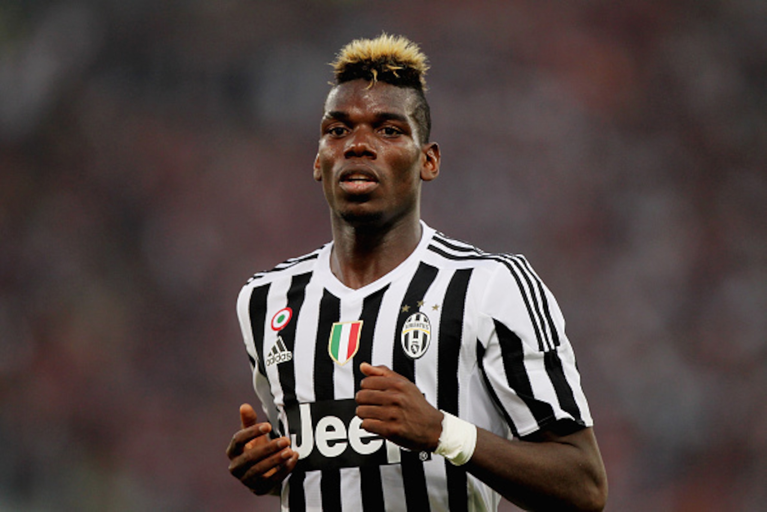 ROME, ITALY - AUGUST 30:  Paul Pogba of Juventus FC looks on during the Serie A match between AS Roma and Juventus FC at Stadio Olimpico on August 30, 2015 in Rome, Italy.  (Photo by Paolo Bruno/Getty Images)