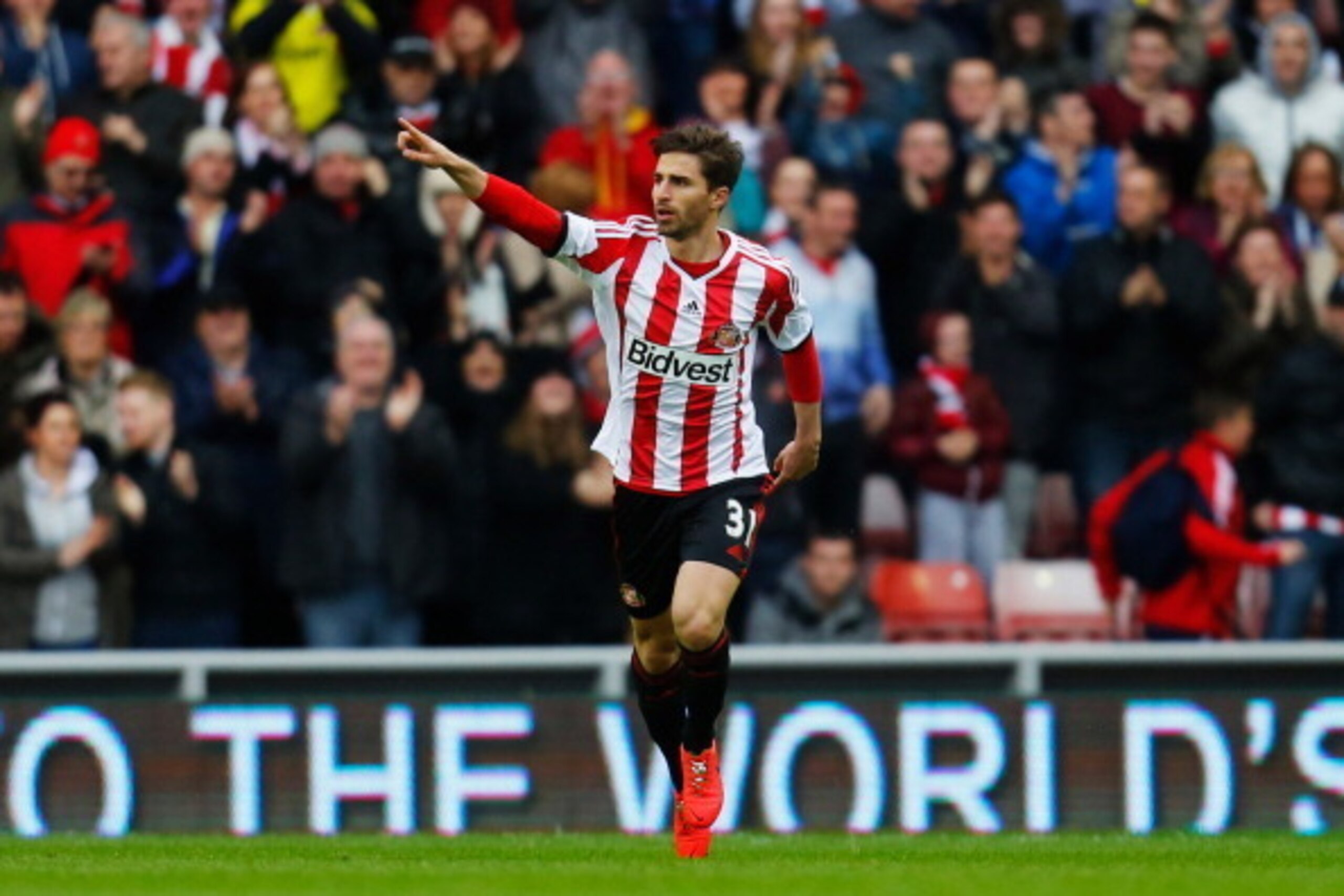 SUNDERLAND, ENGLAND - MAY 11:  Fabio Borini of Sunderland celebrates as he scores their first goal during the Barclays Premier League match between Sunderland and Swansea City at Stadium of Light on May 11, 2014 in Sunderland, England.  (Photo by Paul Tho