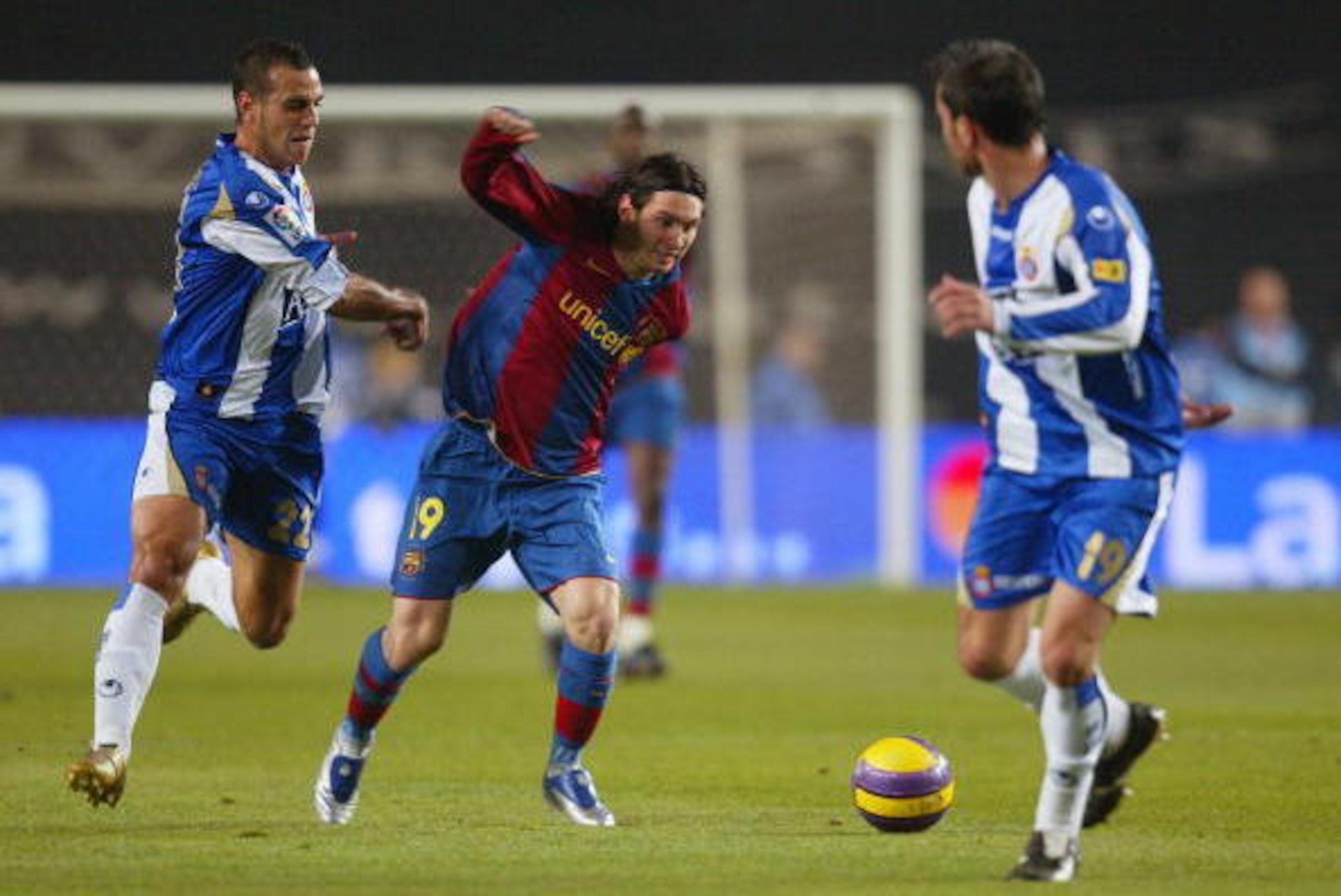 BARCELONA, SPAIN - DECEMBER 1: Leo Messi of Barcelona and Moises Hurtado of Espanyol in action during the La Liga match between RCD Espanyol and FC Barcelona, played at the Lluis Cimpanys stadium on December 1, 2007 in Barcelona, Spain (Photo by Bagu Blan