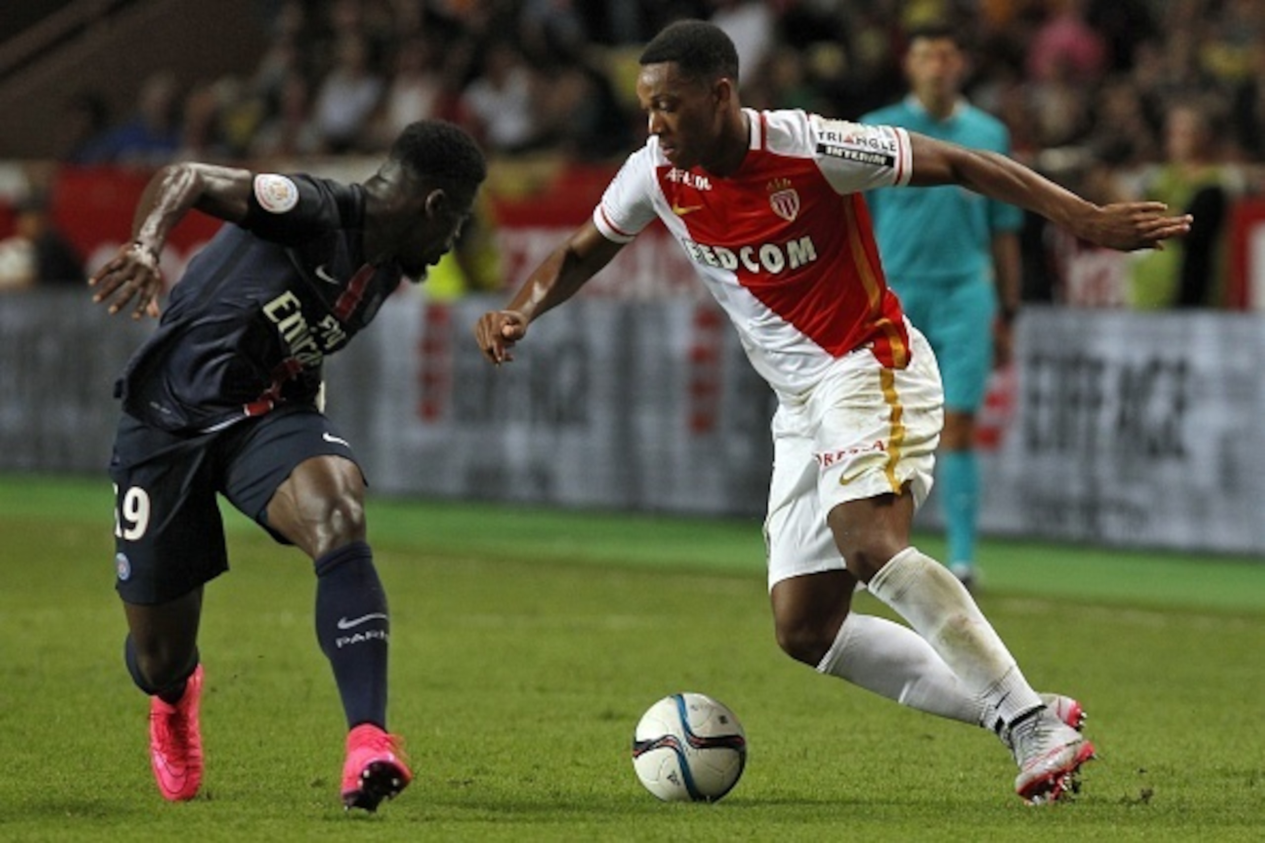 Monaco's French forward Anthony Martial (R) vies with Paris Saint-Germain's Ivorian defender Serge Aurier during the French L1 football match Monaco (ASM) vs Paris Saint-Germain (PSG), on August 30, 2015 at the Louis II stadium in Monaco. AFP PHOTO / J Monaco's French forward Anthony Martial (R) vies with Paris Saint-Germain's Ivorian defender Serge Aurier during the French L1 football match Monaco (ASM) vs Paris Saint-Germain (PSG), on August 30, 2015 at the Louis II stadium in Monaco. AFP PHOTO / J