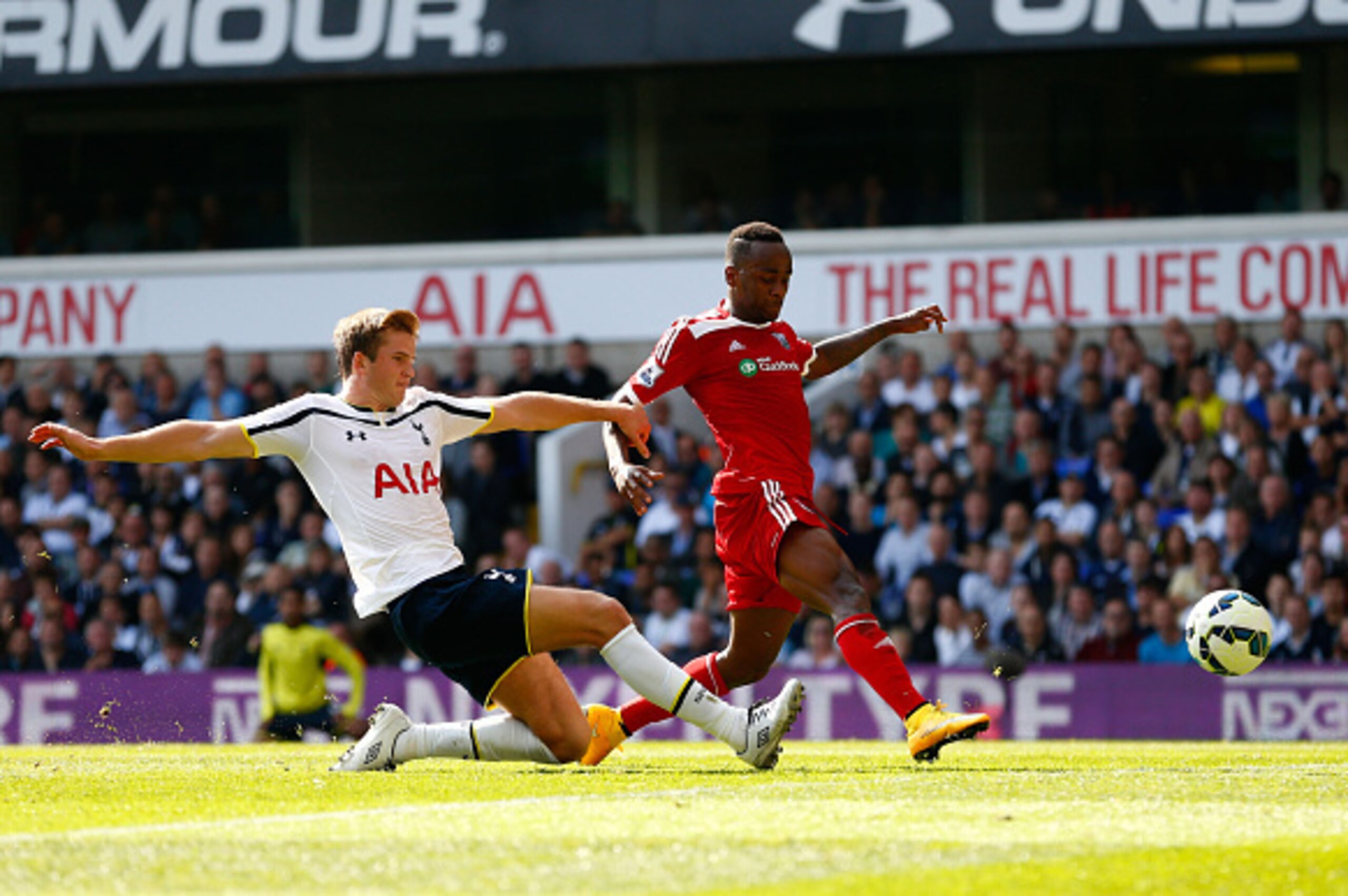 LONDON, ENGLAND - SEPTEMBER 21:  Saido Berahino of West Brom scores a disallowed goal as Eric Dier of Spurs closes in during the Barclays Premier League match between Tottenham Hotspur and West Bromwich Albion at White Hart Lane on September 21, 2014 in L