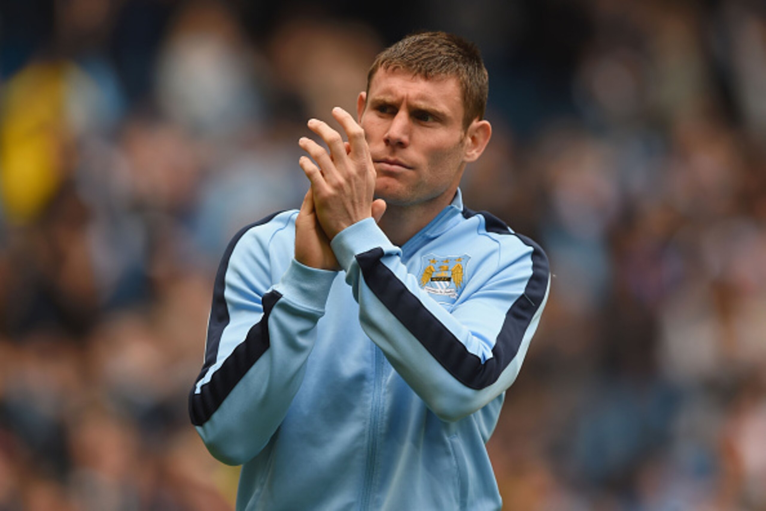 MANCHESTER, ENGLAND - MAY 24:  James Milner of Manchester City applauds supporters after the Barclays Premier League match between Manchester City and Southampton at Etihad Stadium on May 24, 2015 in Manchester, England.  (Photo by Shaun Botterill/Getty I