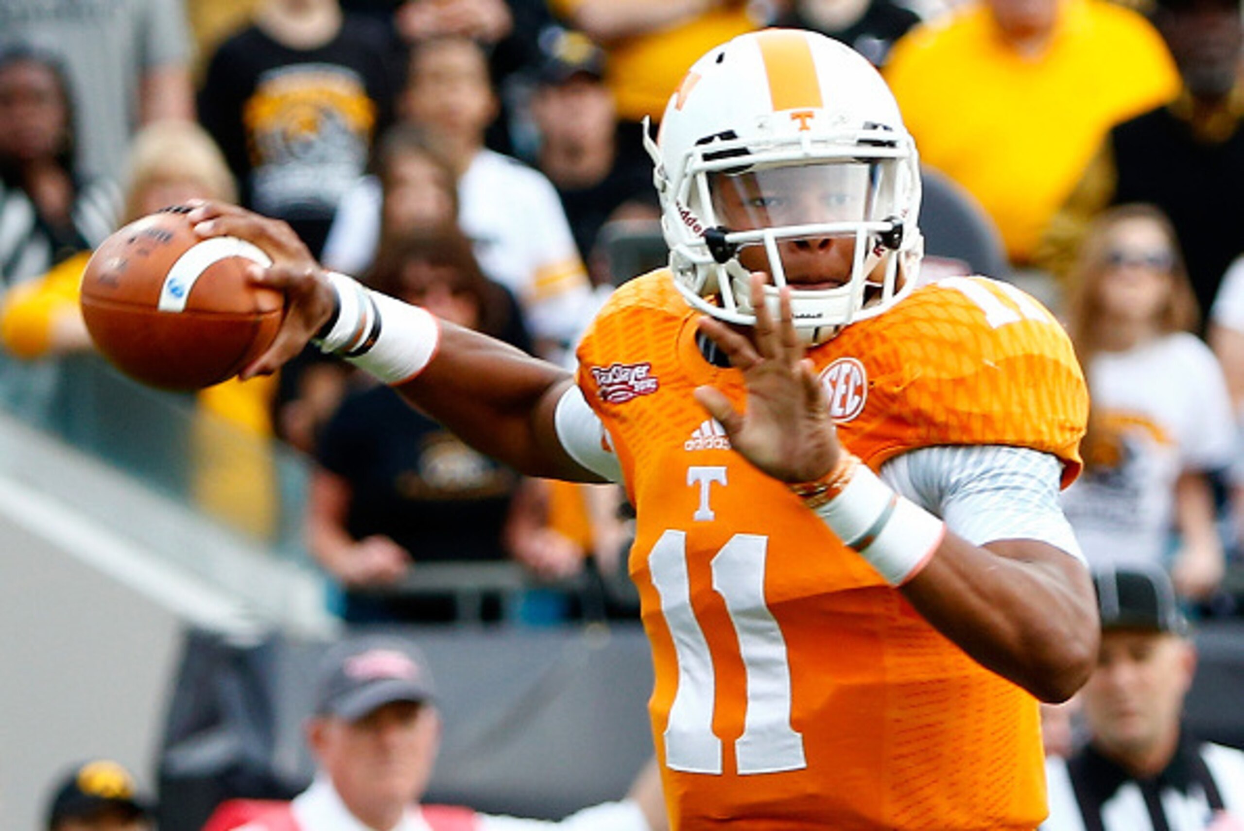 JACKSONVILLE, FL - JANUARY 02:  Joshua Dobbs #11 of the Tennessee Volunteers attempts a pass during the TaxSlayer Bowl against the Iowa Hawkeyes at EverBank Field on January 2, 2015 in Jacksonville, Florida.  (Photo by Sam Greenwood/Getty Images)