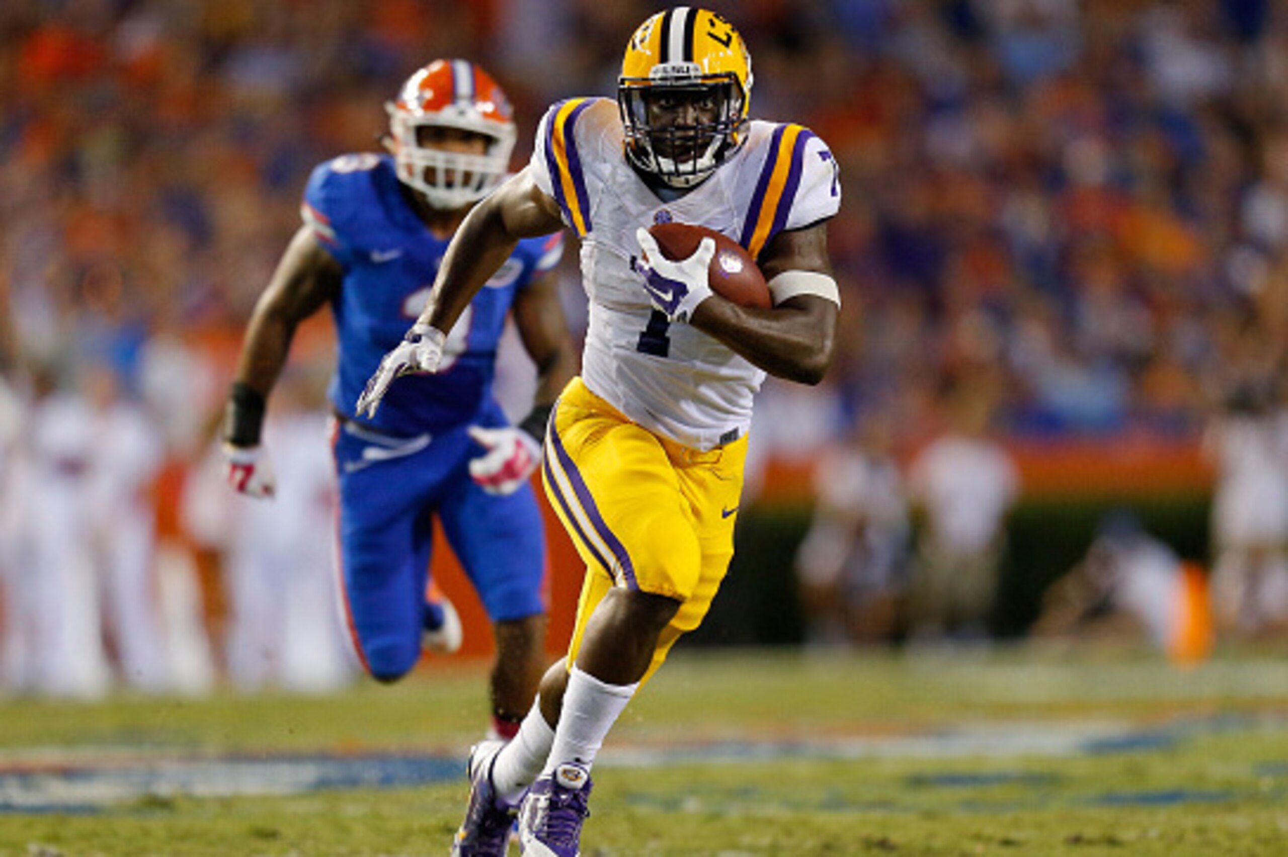 GAINESVILLE, FL - OCTOBER 11: Leonard Fournette #7 of the LSU Tigers carries the ball during the second quarter of the game against the Florida Gators at Ben Hill Griffin Stadium on October 11, 2014 in Gainesville, Florida.  (Photo by Rob Foldy/Getty Imag