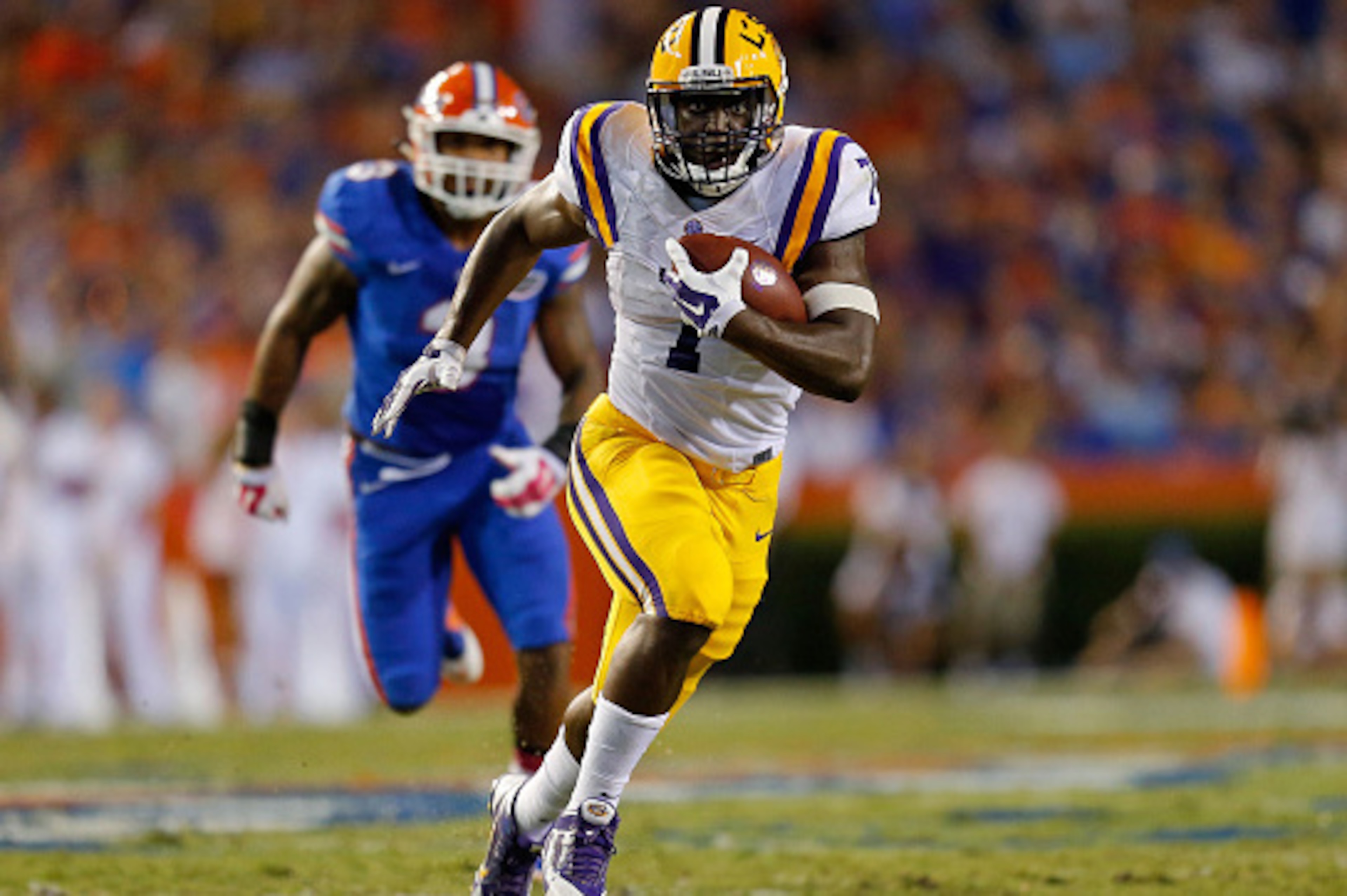 GAINESVILLE, FL - OCTOBER 11: Leonard Fournette #7 of the LSU Tigers carries the ball during the second quarter of the game against the Florida Gators at Ben Hill Griffin Stadium on October 11, 2014 in Gainesville, Florida.  (Photo by Rob Foldy/Getty Imag