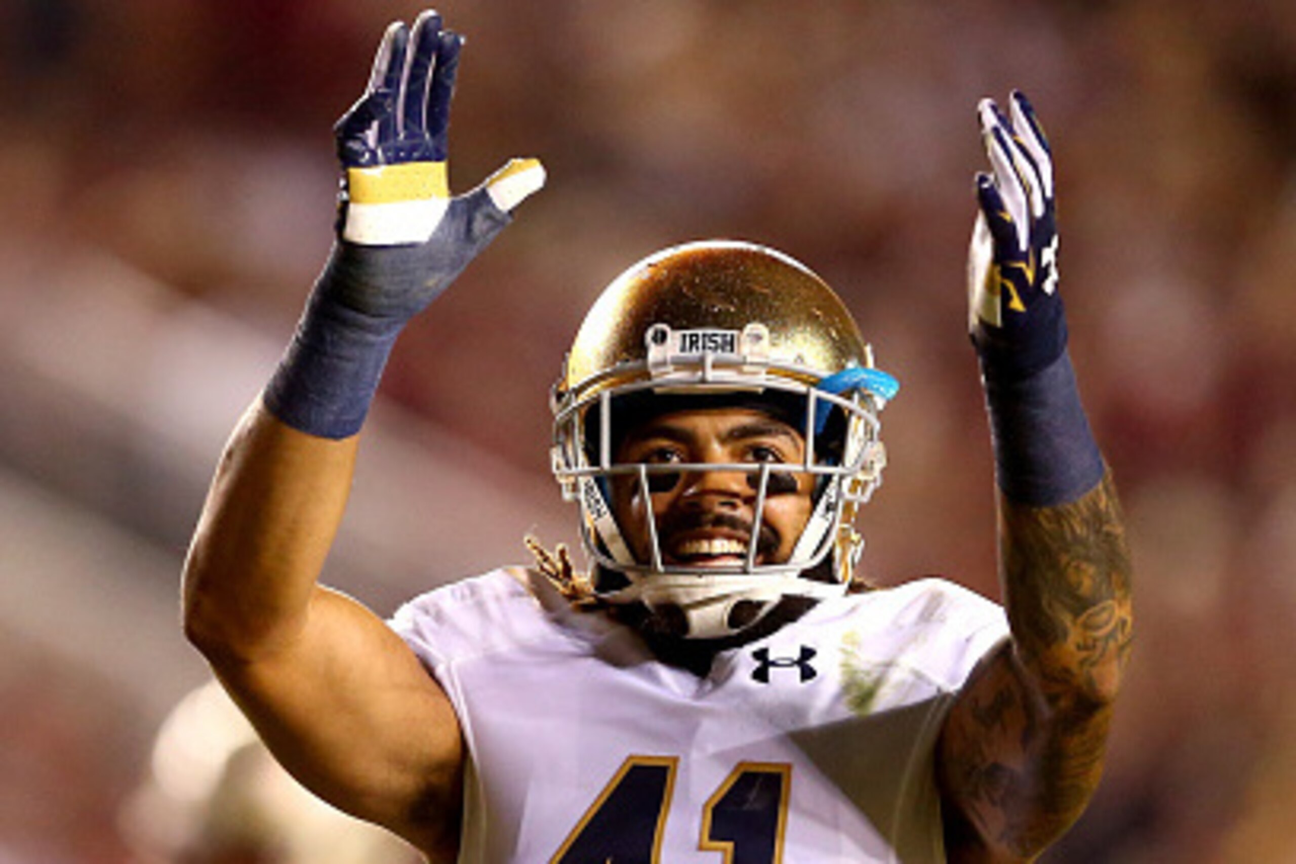 TALLAHASSEE, FL - OCTOBER 18:  Matthias Farley #41 of the Notre Dame Fighting Irish reacts to the crowd during their game against the Florida State Seminoles at Doak Campbell Stadium on October 18, 2014 in Tallahassee, Florida.  (Photo by Streeter Lecka/G