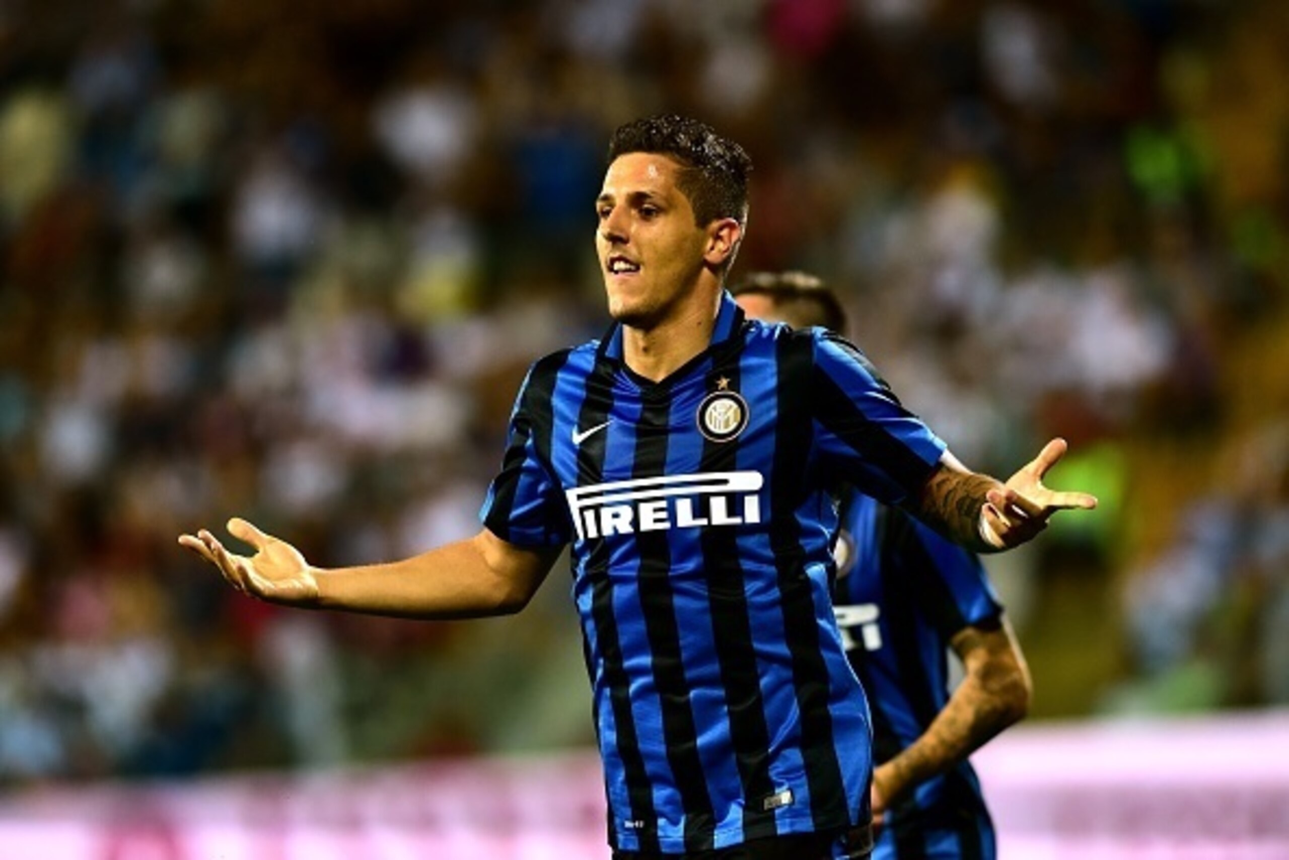 Inter Milan's midfielder from Montenegro Stevan Jovetic celebrates after scoring a goal during the Italian Serie A football match Carpi Vs Inter Milan at the Alberto Braglia Stadium in Modena on August 30, 2015. AFP PHOTO / GIUSEPPE CACACE        (Photo c