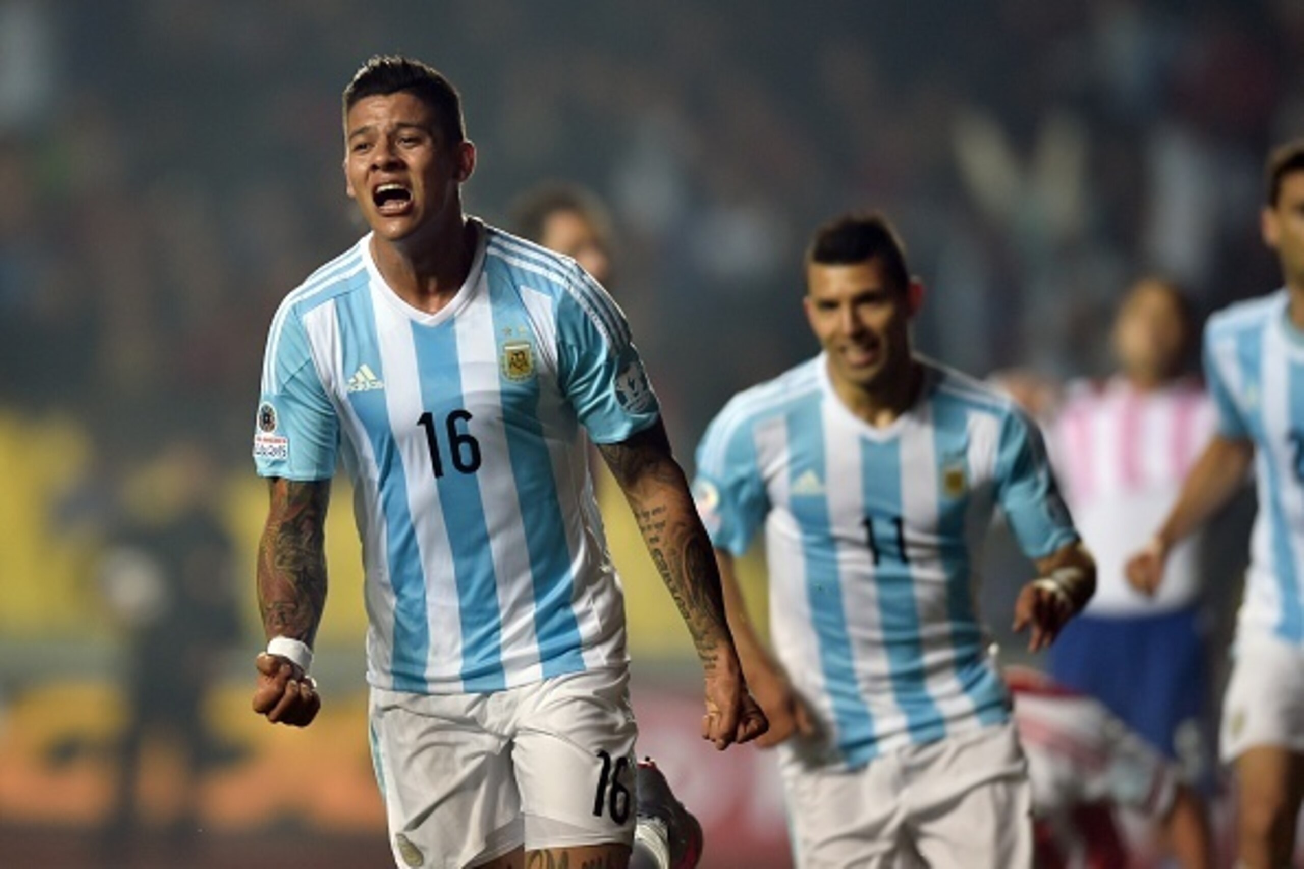 Argentina's defender Marcos Rojo celebrates after scoring against Paraguay during their Copa America semifinal football match in Concepcion, Chile on June 30, 2015.  AFP PHOTO / YURI CORTEZ        (Photo credit should read YURI CORTEZ/AFP/Getty Images)