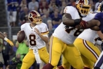 Aug 29, 2015; Baltimore, MD, USA; Washington Redskins quarterback Kirk Cousins (8) drops back to pass during the first quarter against the Baltimore Ravens at M&T Bank Stadium. Mandatory Credit: Tommy Gilligan-USA TODAY Sports