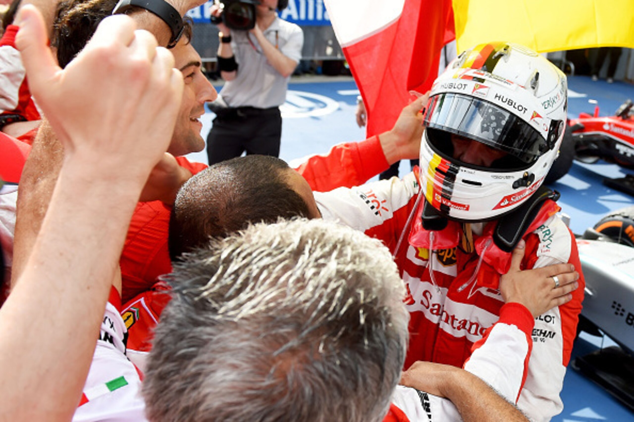 KUALA LUMPUR, MALAYSIA - MARCH 29:  Sebastian Vettel of Germany and Ferrari celebrates in Parc Ferme after winning the Malaysia Formula One Grand Prix at Sepang Circuit on March 29, 2015 in Kuala Lumpur, Malaysia.  (Photo by Lars Baron/Getty Images)