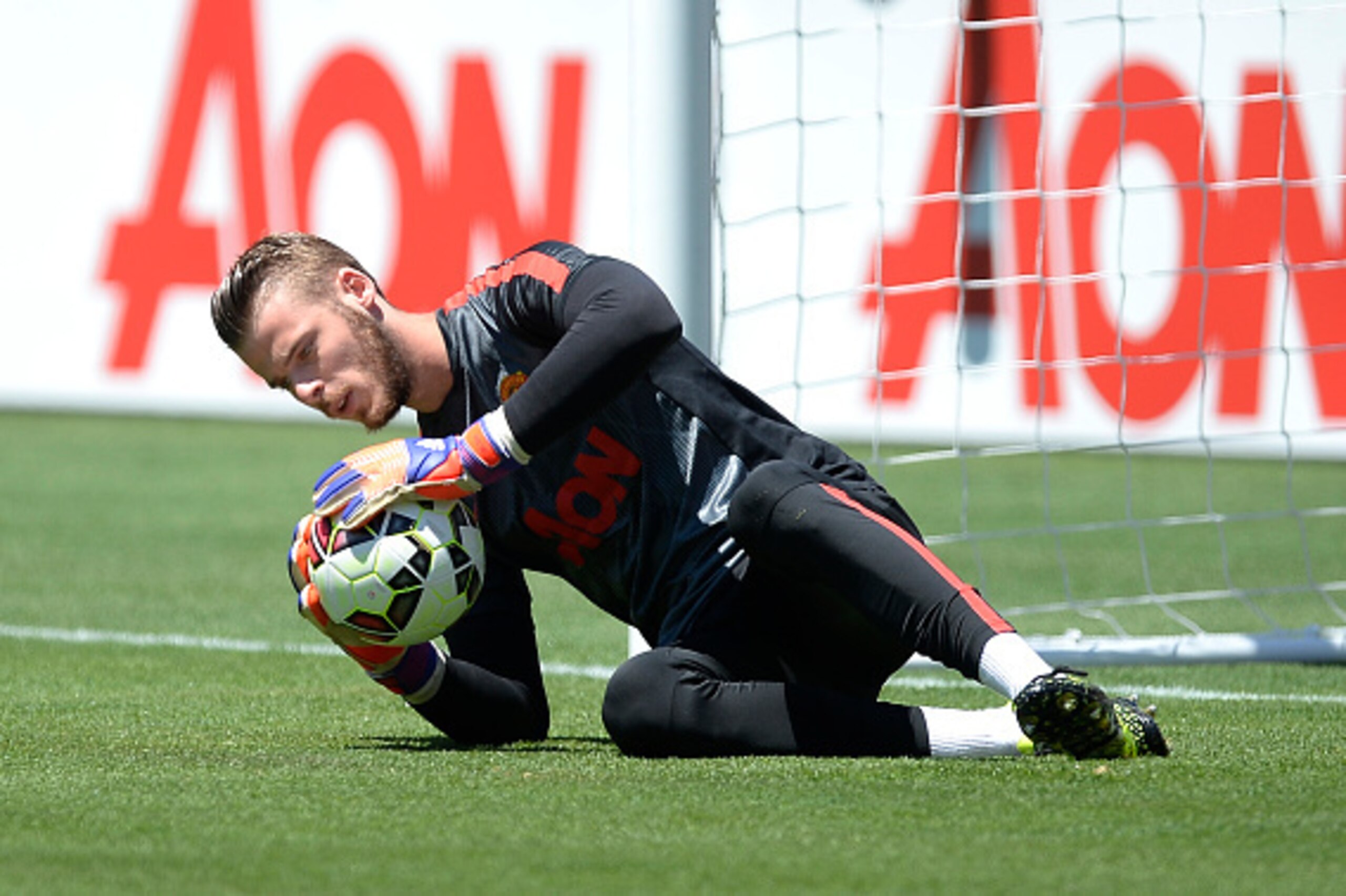 SANTA CLARA, CA - JULY 25:  Goalkeeper David De Gea #1 of Manchester United dives for the ball during warm up before the start of International Champions Cup friendly soccer match against FC Barcelona at the Levi's Stadium July 25, 2015 in Santa Clara, Ca