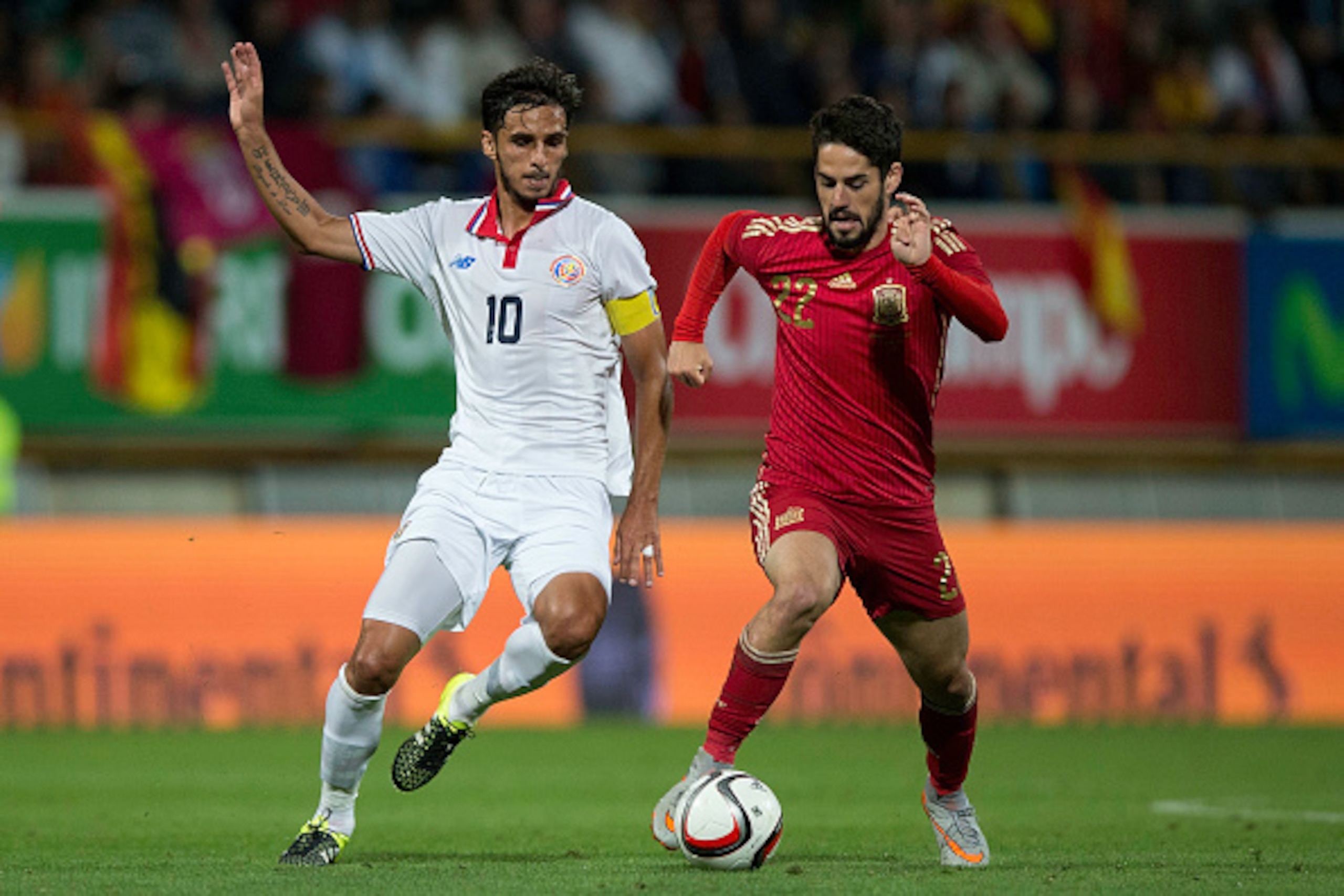 LEON, SPAIN - JUNE 11: Francisco Alarcon alias Isco (R) of Spain competes for the ball with Bryan Ruiz (L) of Costa Rica during the international friendly match between Spain and Costa Rica at Reino de Leon Stadium on June 11, 2015 in Leon, Spain. (Photo LEON, SPAIN - JUNE 11: Francisco Alarcon alias Isco (R) of Spain competes for the ball with Bryan Ruiz (L) of Costa Rica during the international friendly match between Spain and Costa Rica at Reino de Leon Stadium on June 11, 2015 in Leon, Spain. (Photo